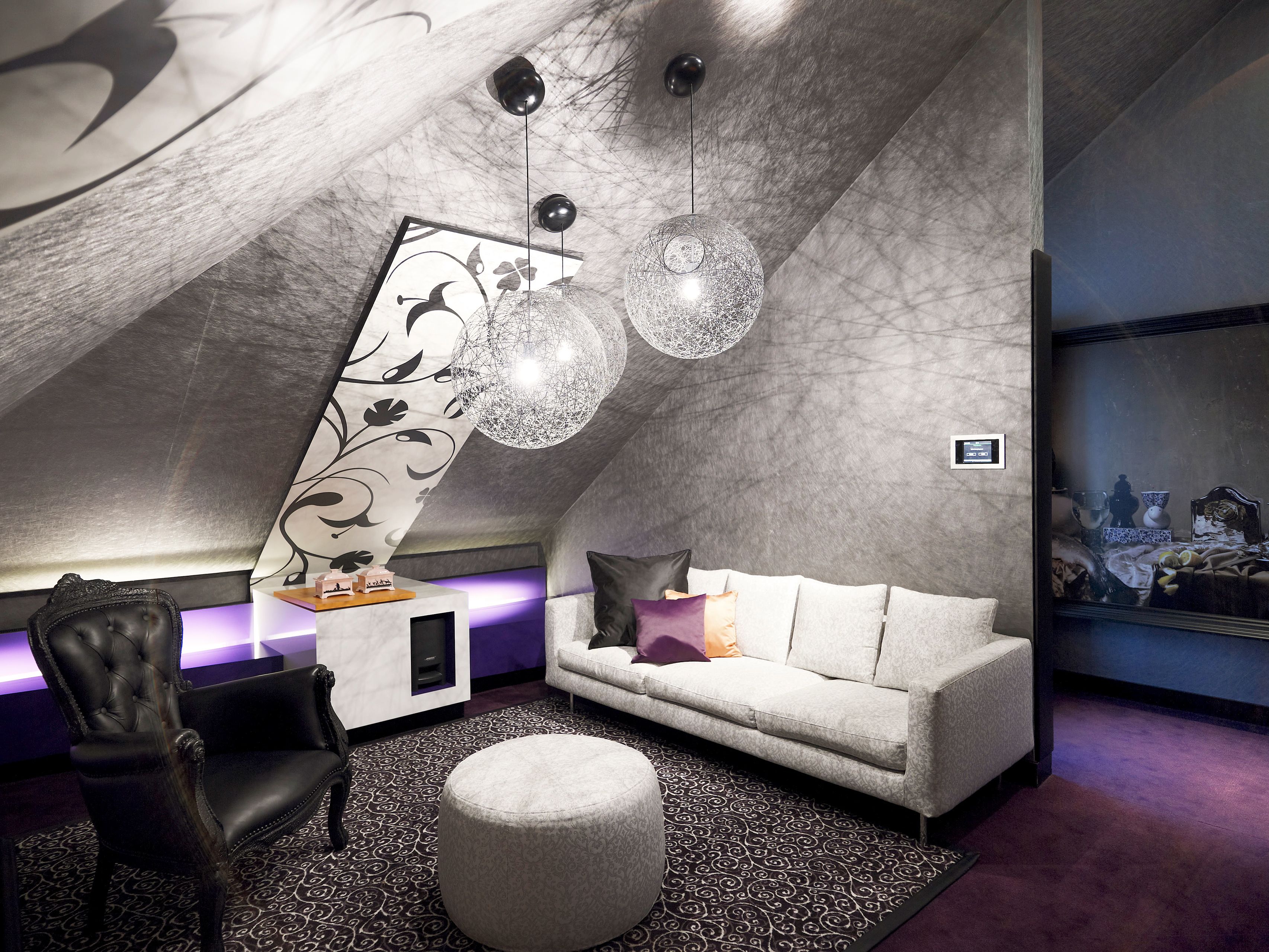 a room with a couch and a chair