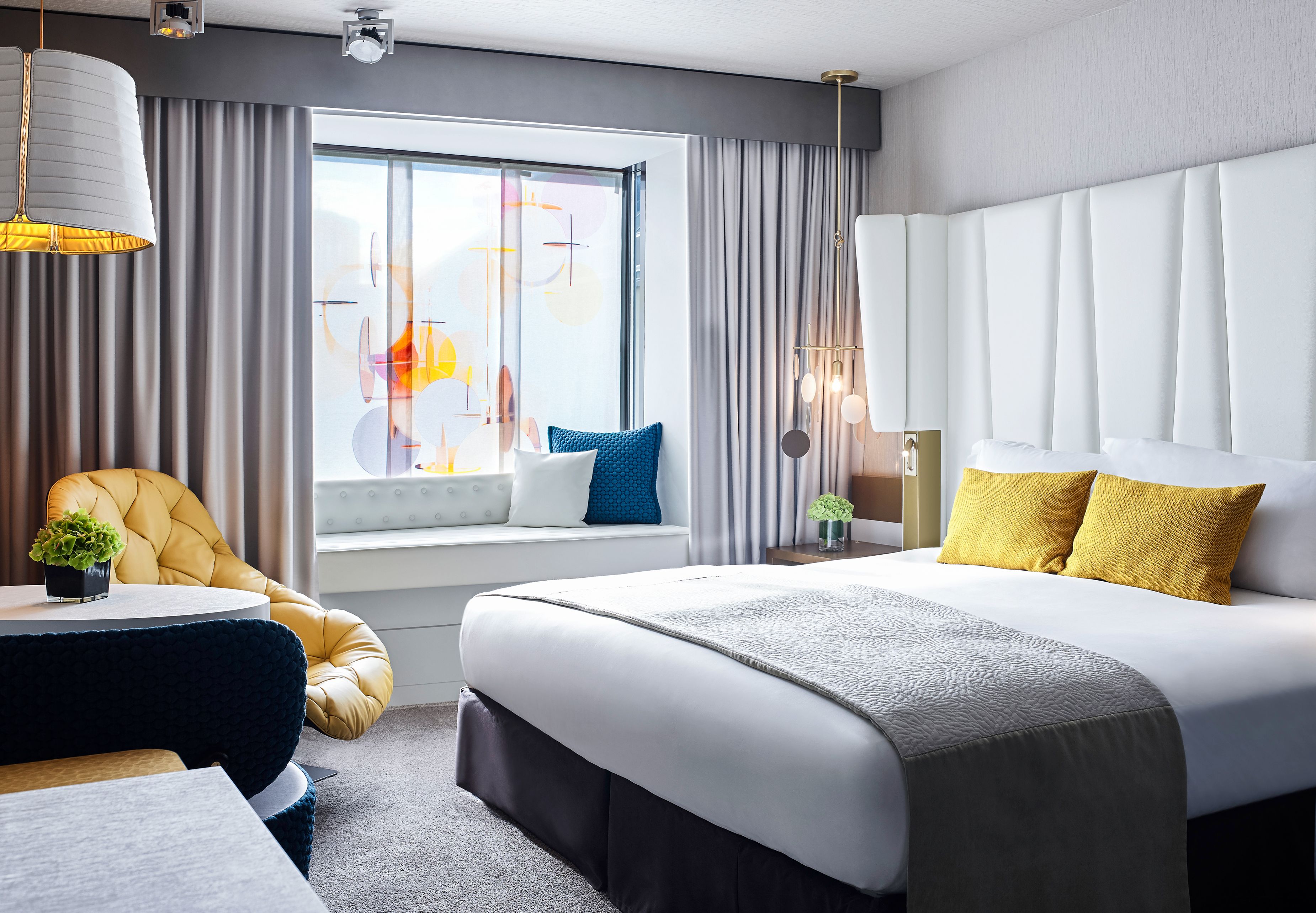 a room with a bed and a window