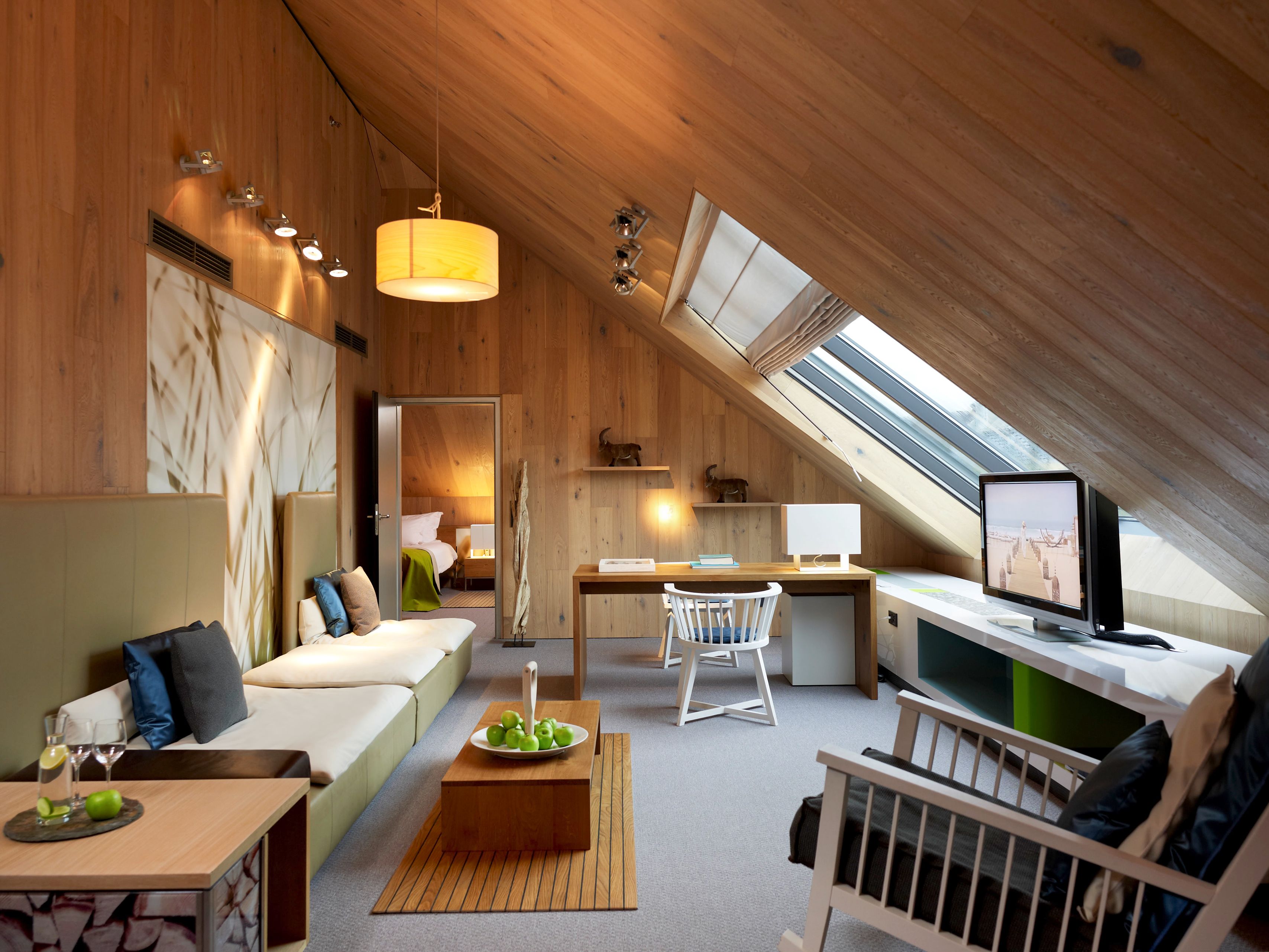 a room with a tv and a couch