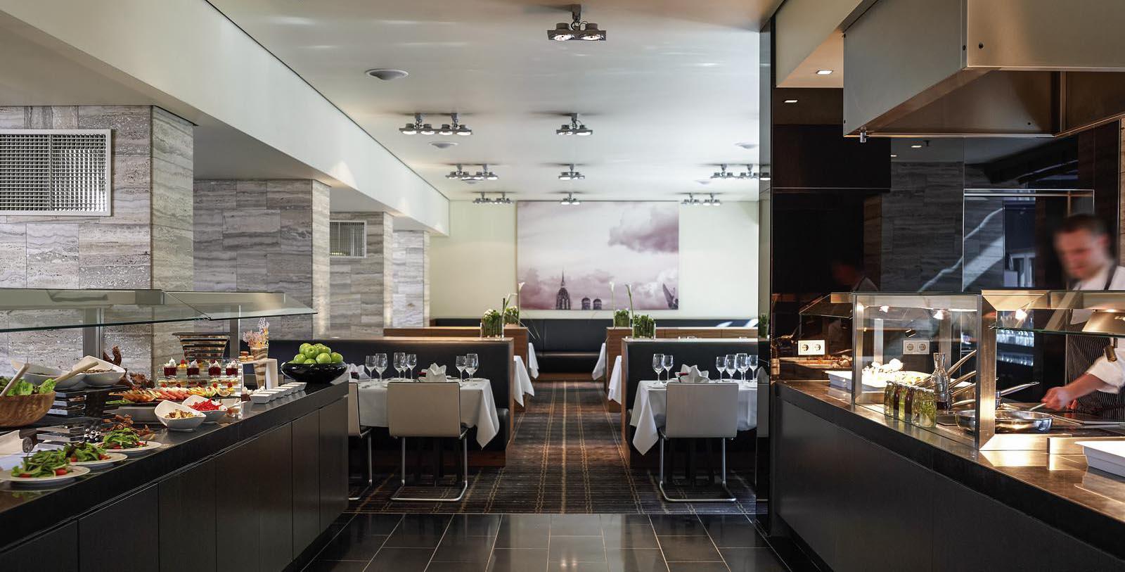 a restaurant with tables and chairs