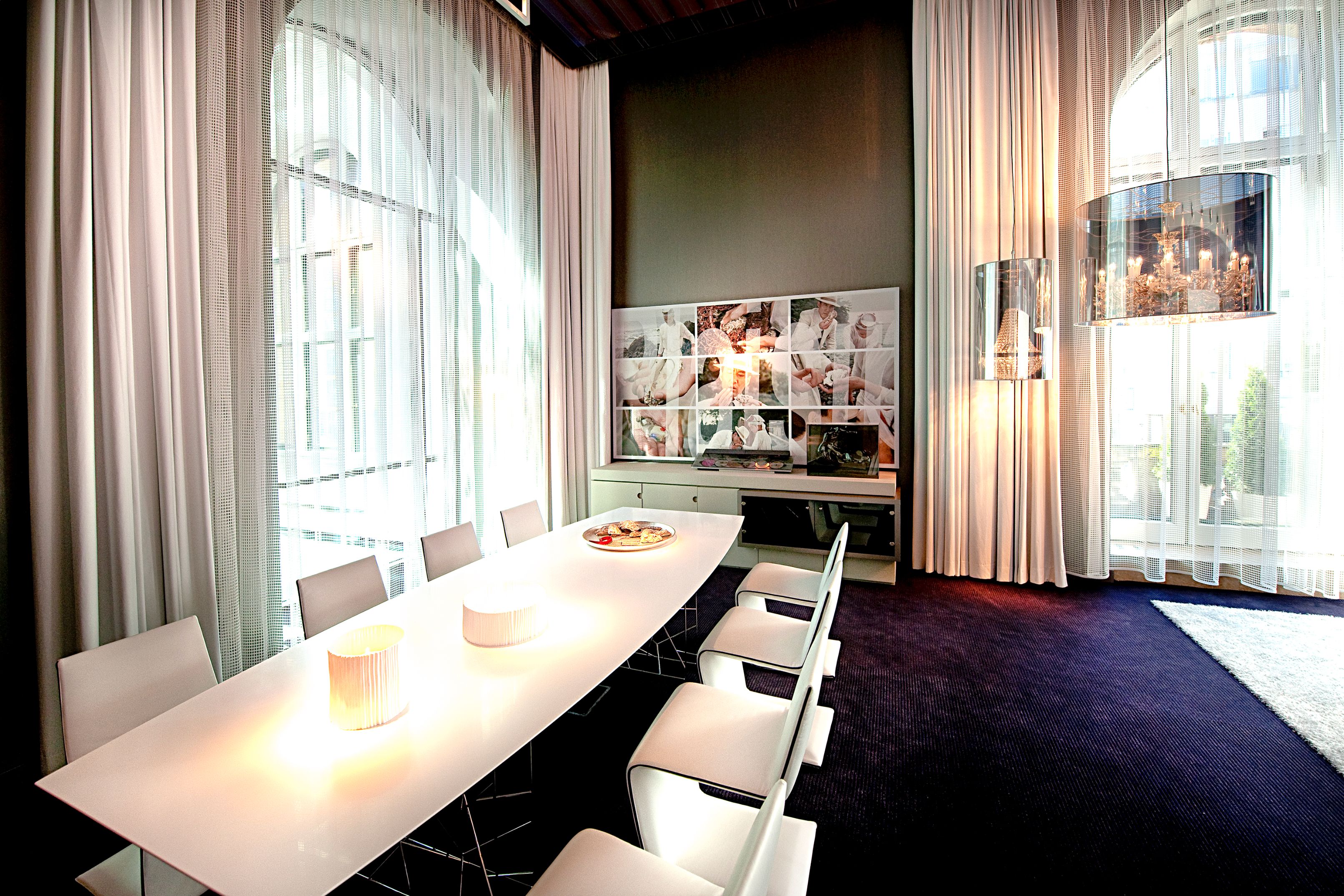 a room with a table and chairs