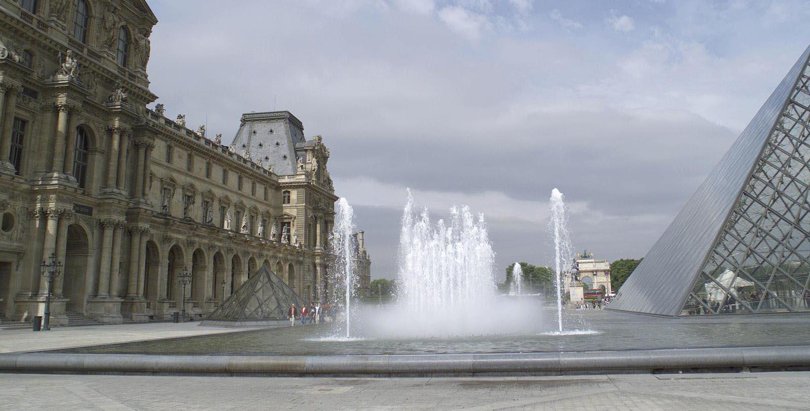 a fountain in front of a building