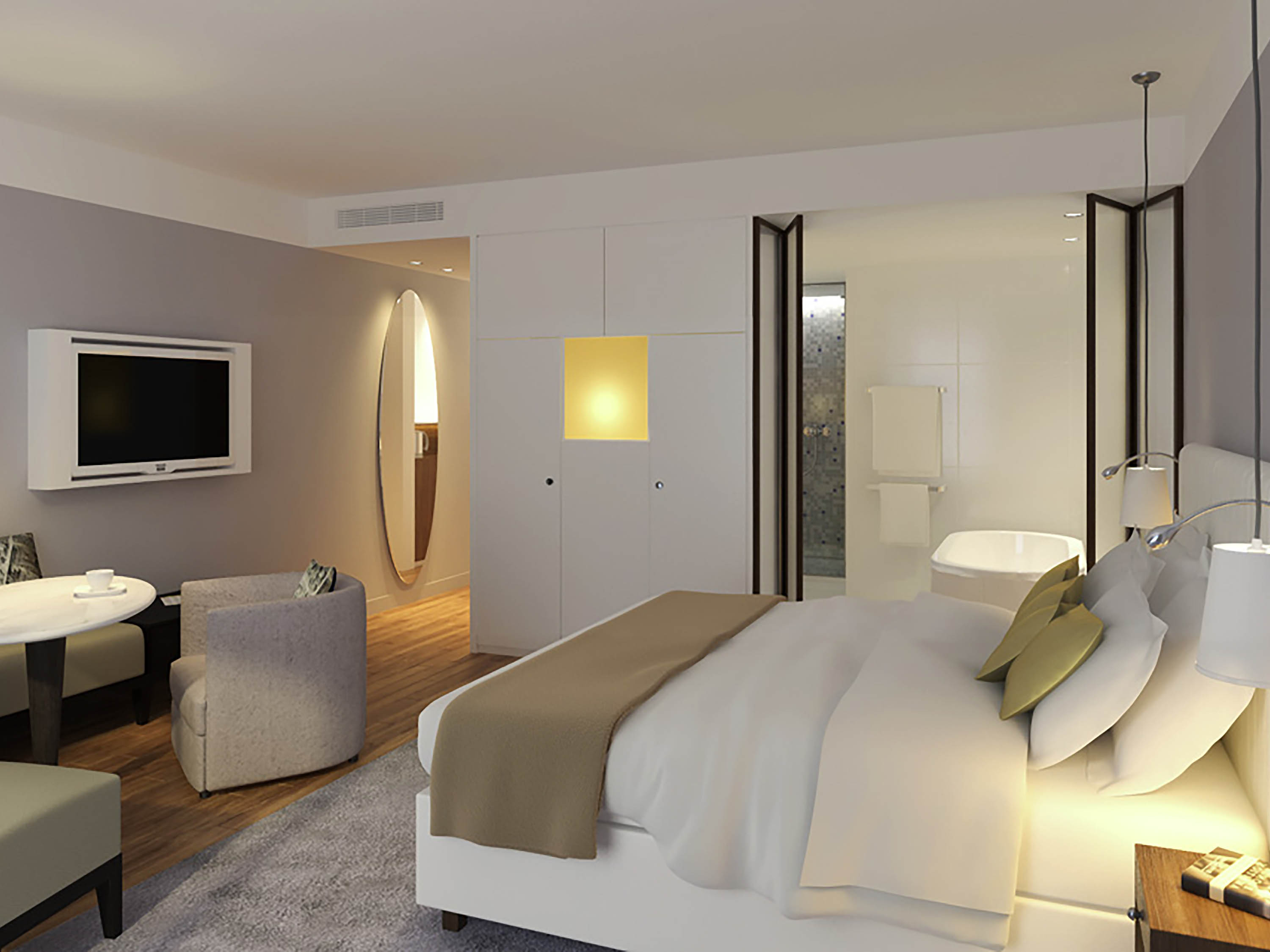 a bedroom with a tv and a bed