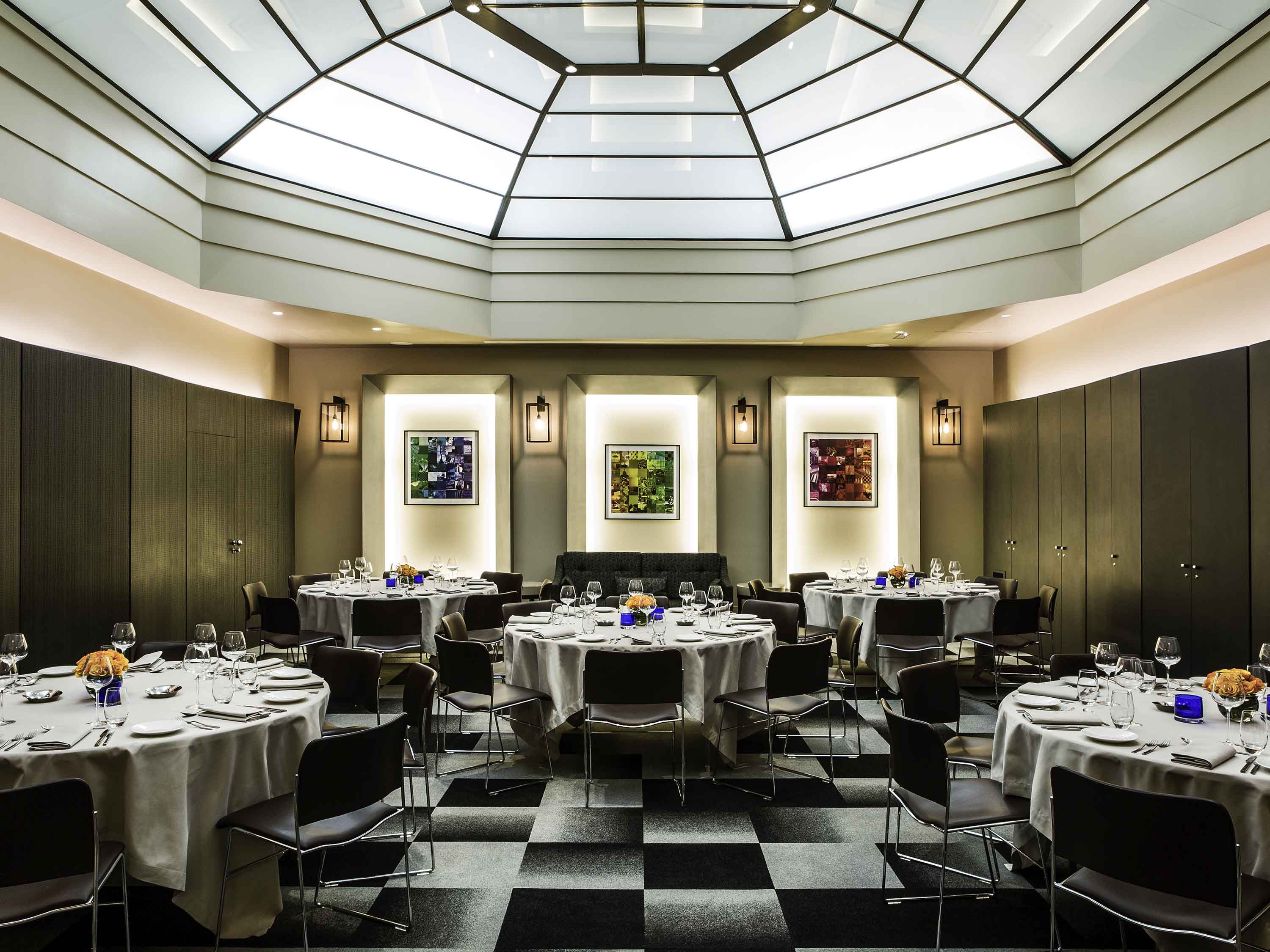 a room with tables and chairs