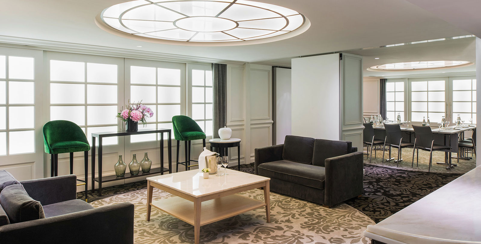 a living room with couches and a coffee table
