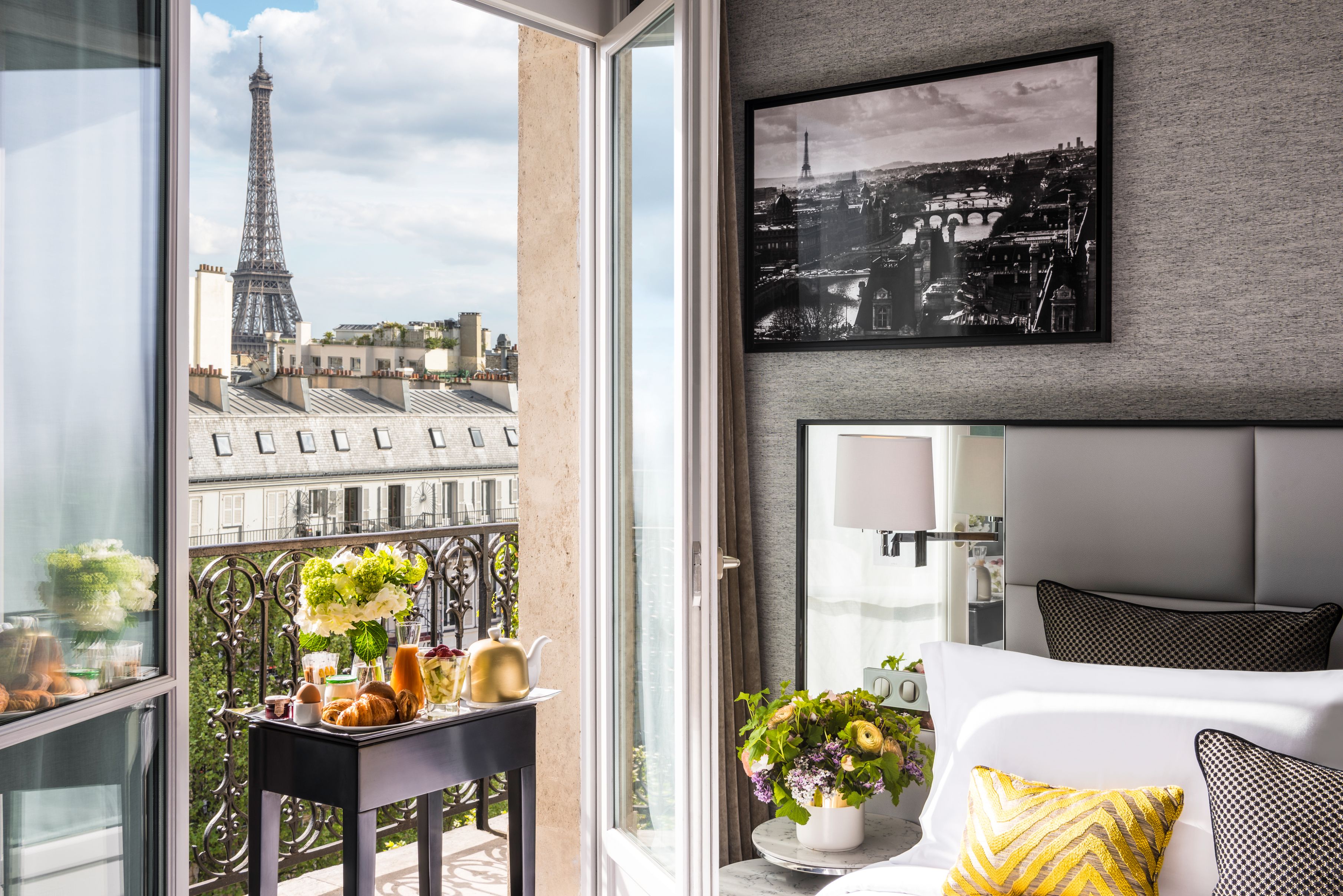 a room with a view of the eiffel tower