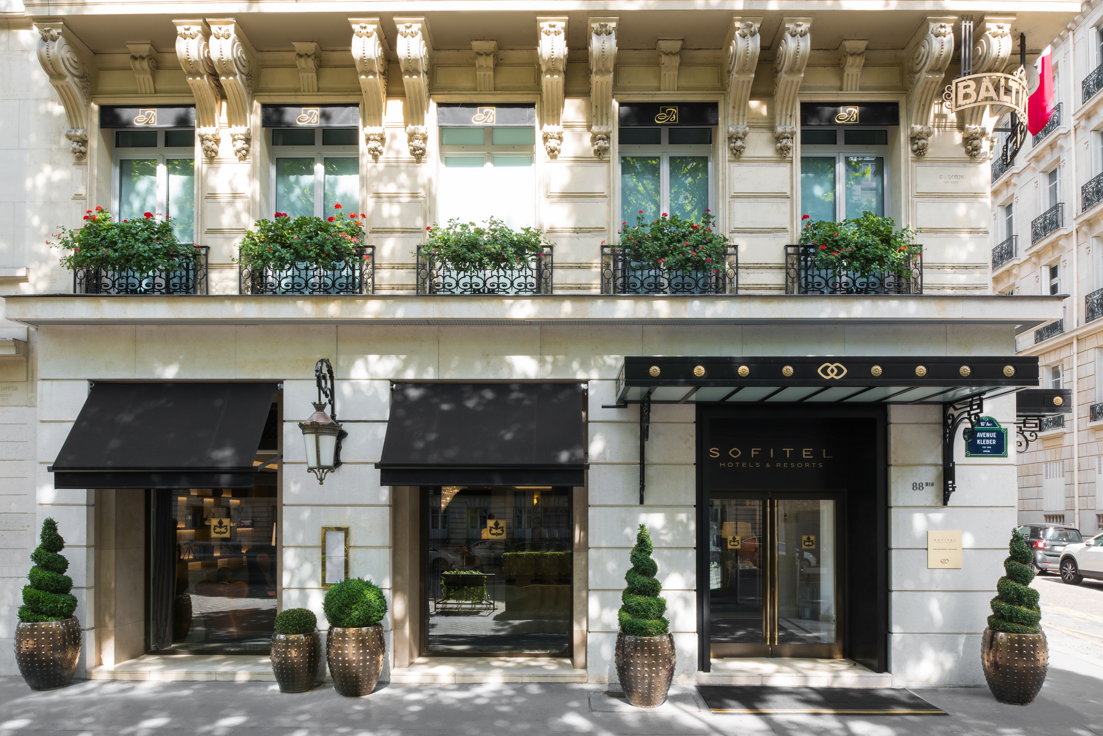 a building with plants on the front