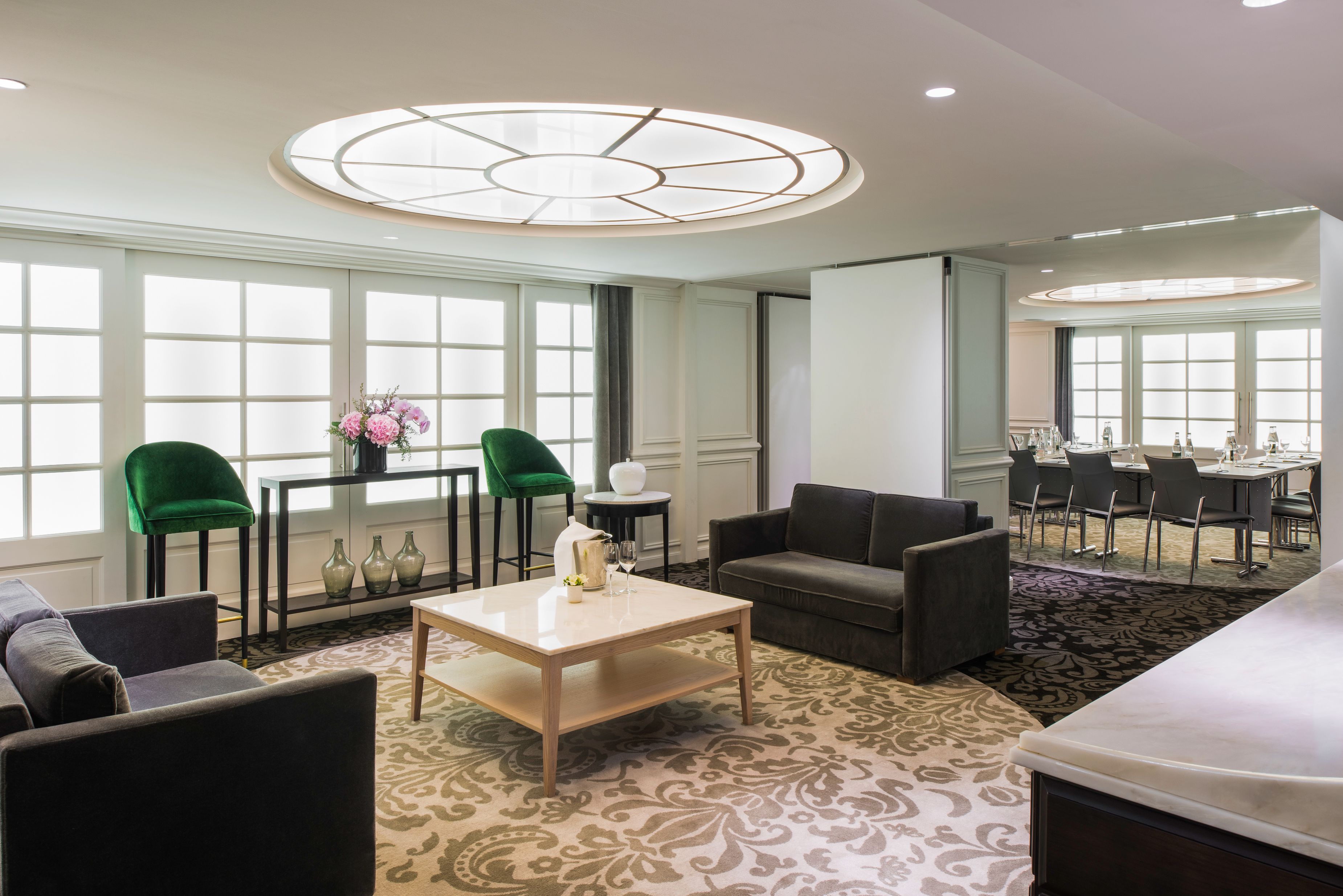 a room with couches and chairs