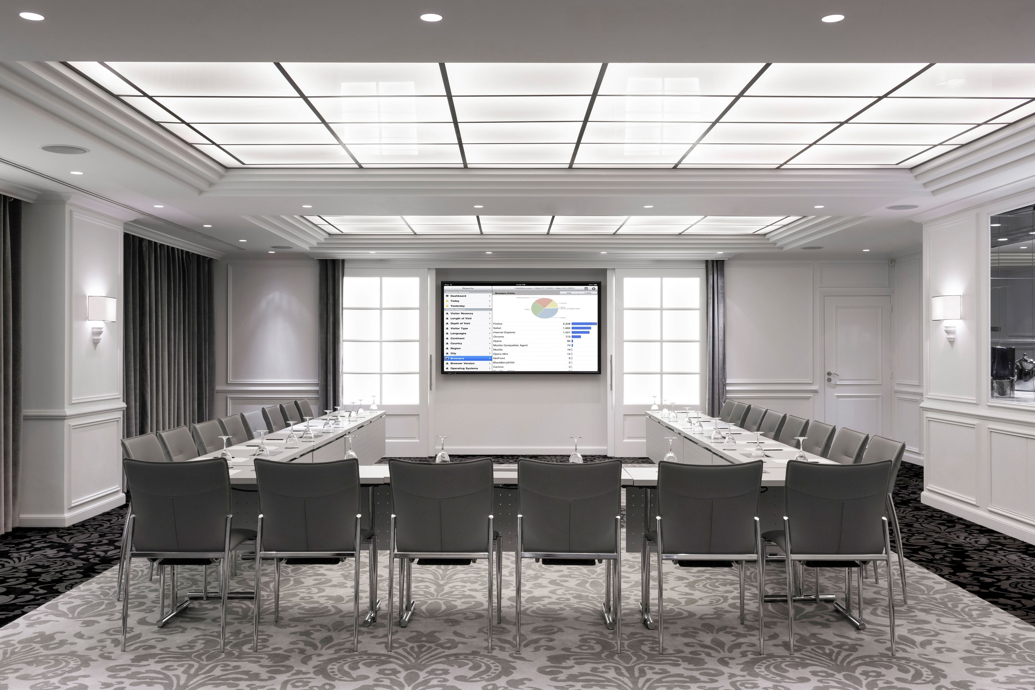 a room with a large table and chairs