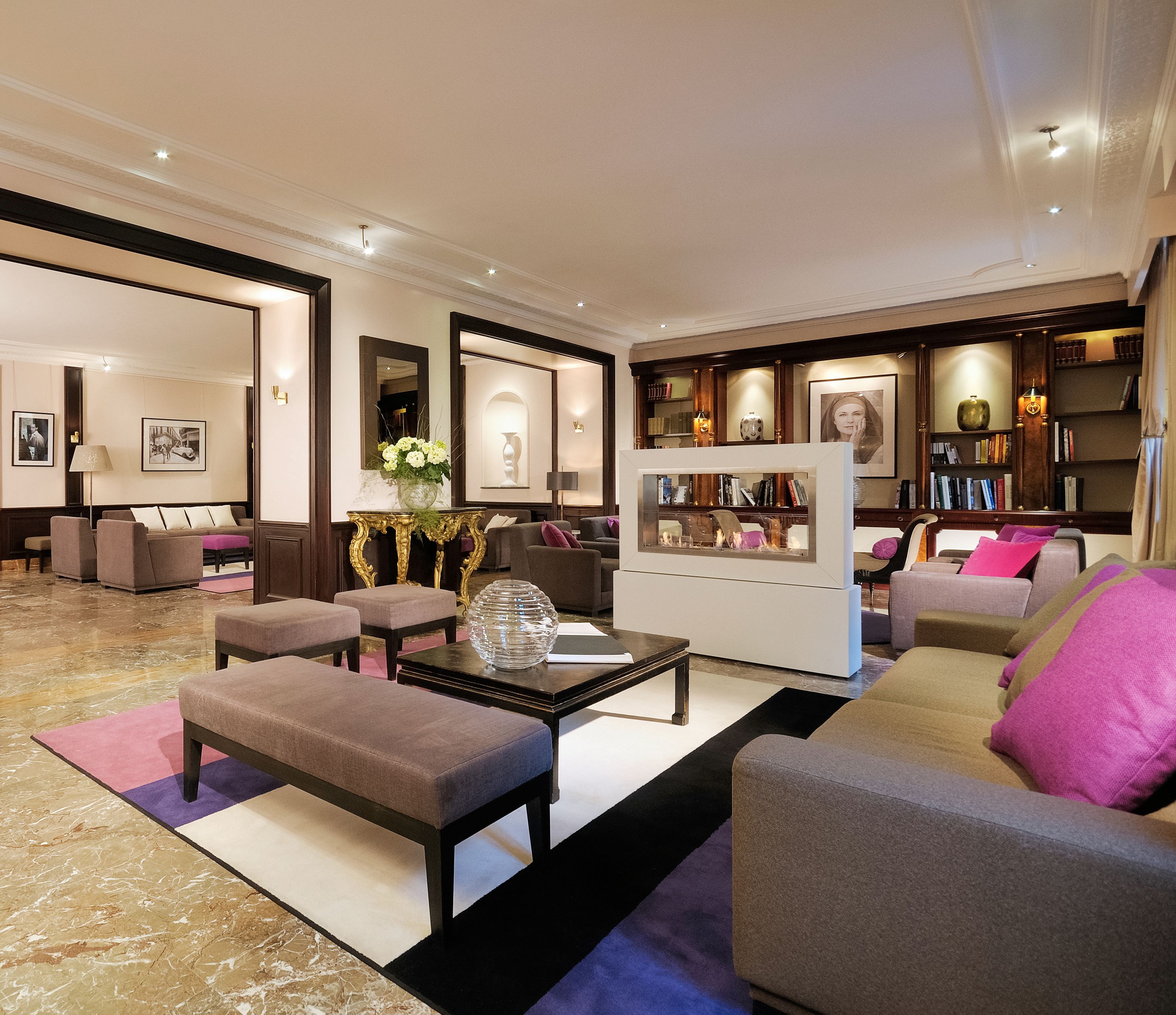a room with couches and tables