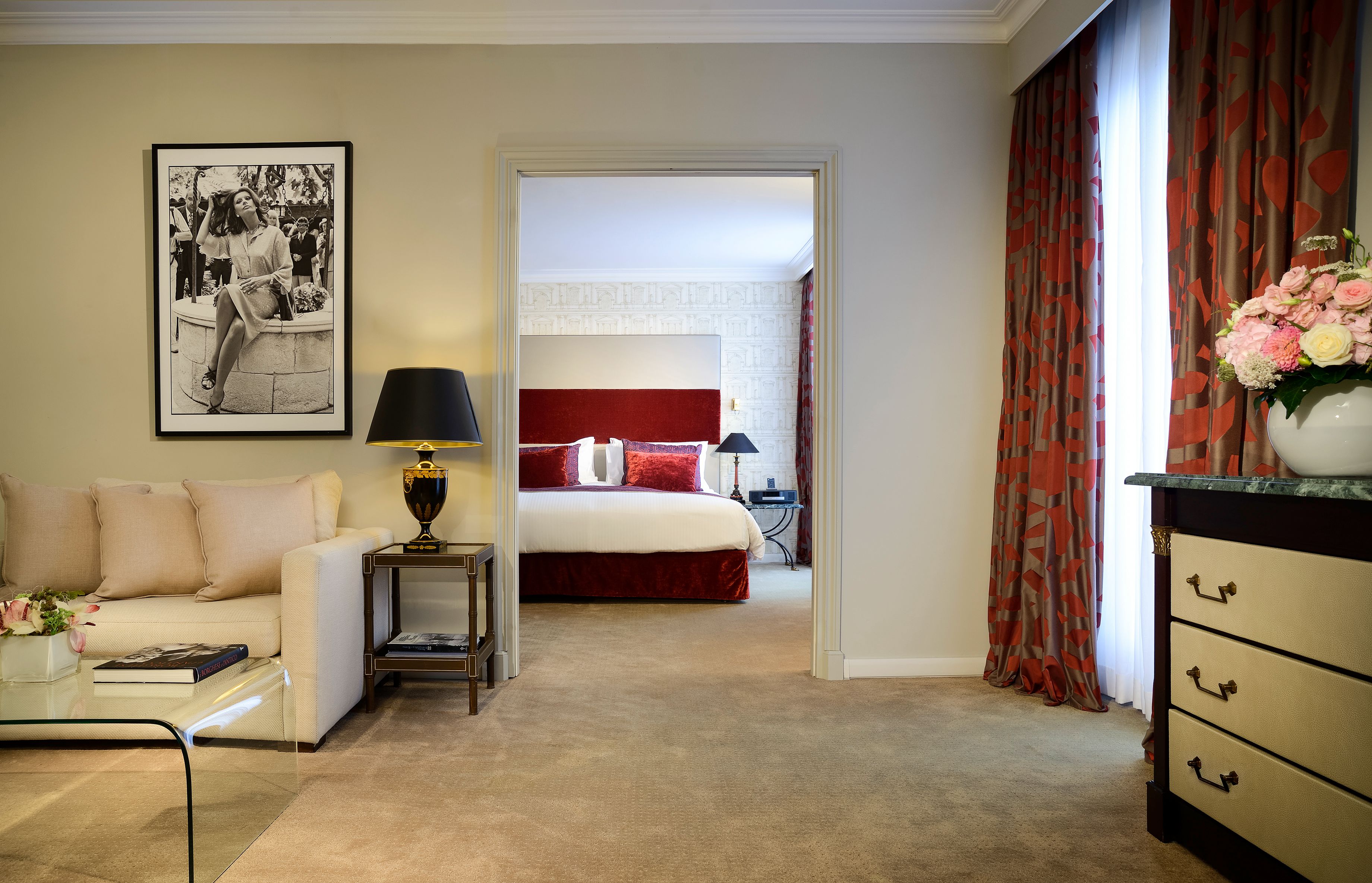 a bedroom with a bed and a couch