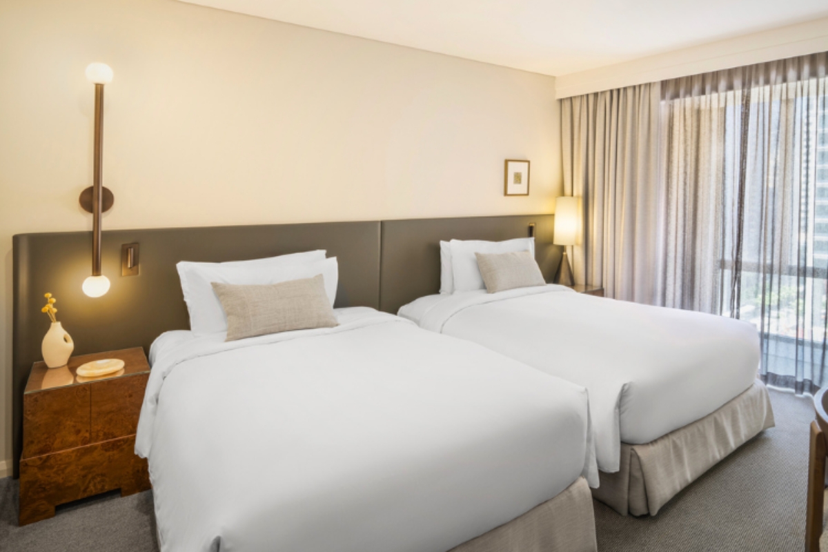 two beds in a hotel room