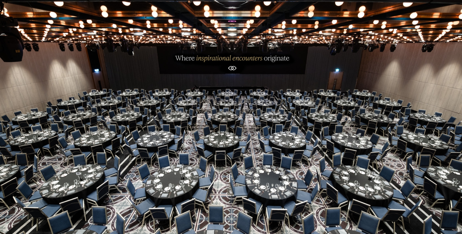 a large room with tables and chairs