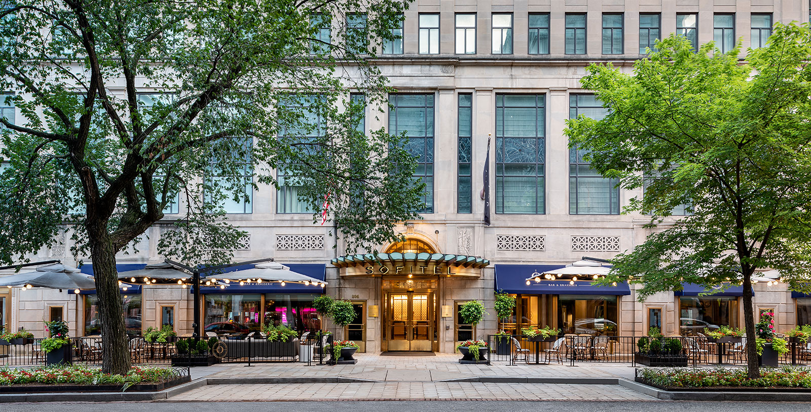 a building with tables and chairs outside