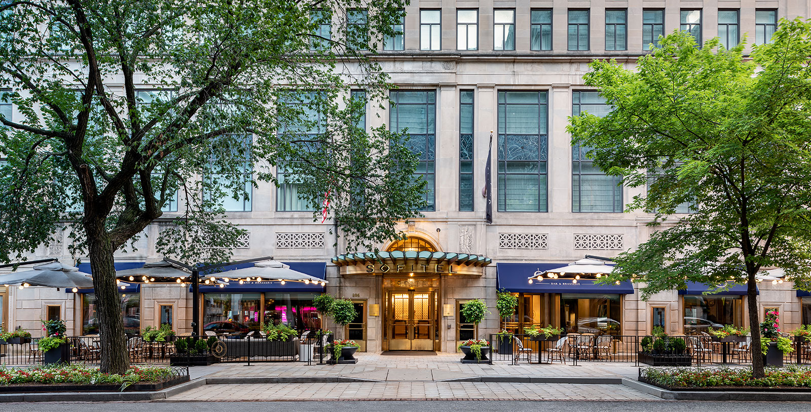 a building with tables and chairs outside
