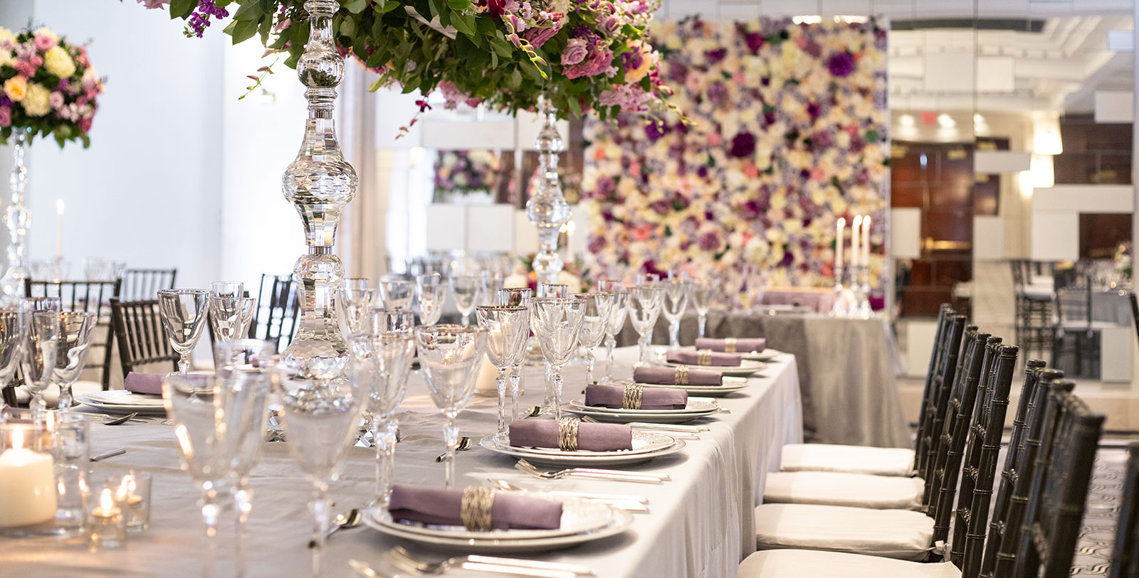 a table set with glasses and plates