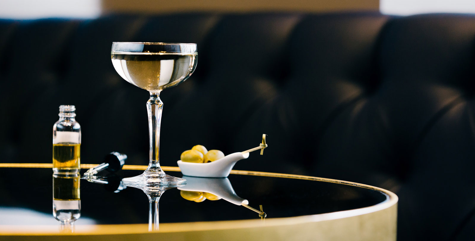 a glass of wine on a table