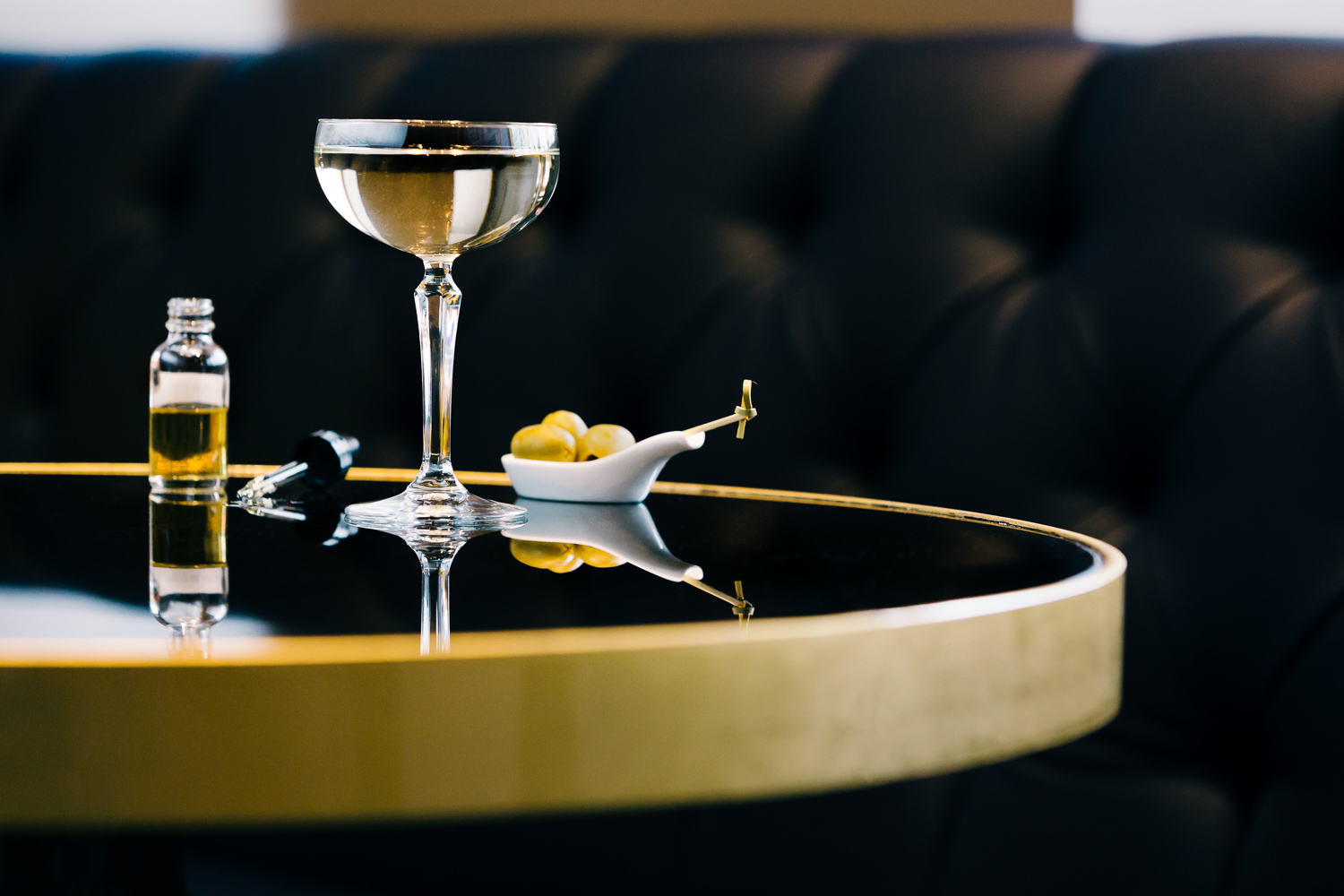 a glass of wine on a table