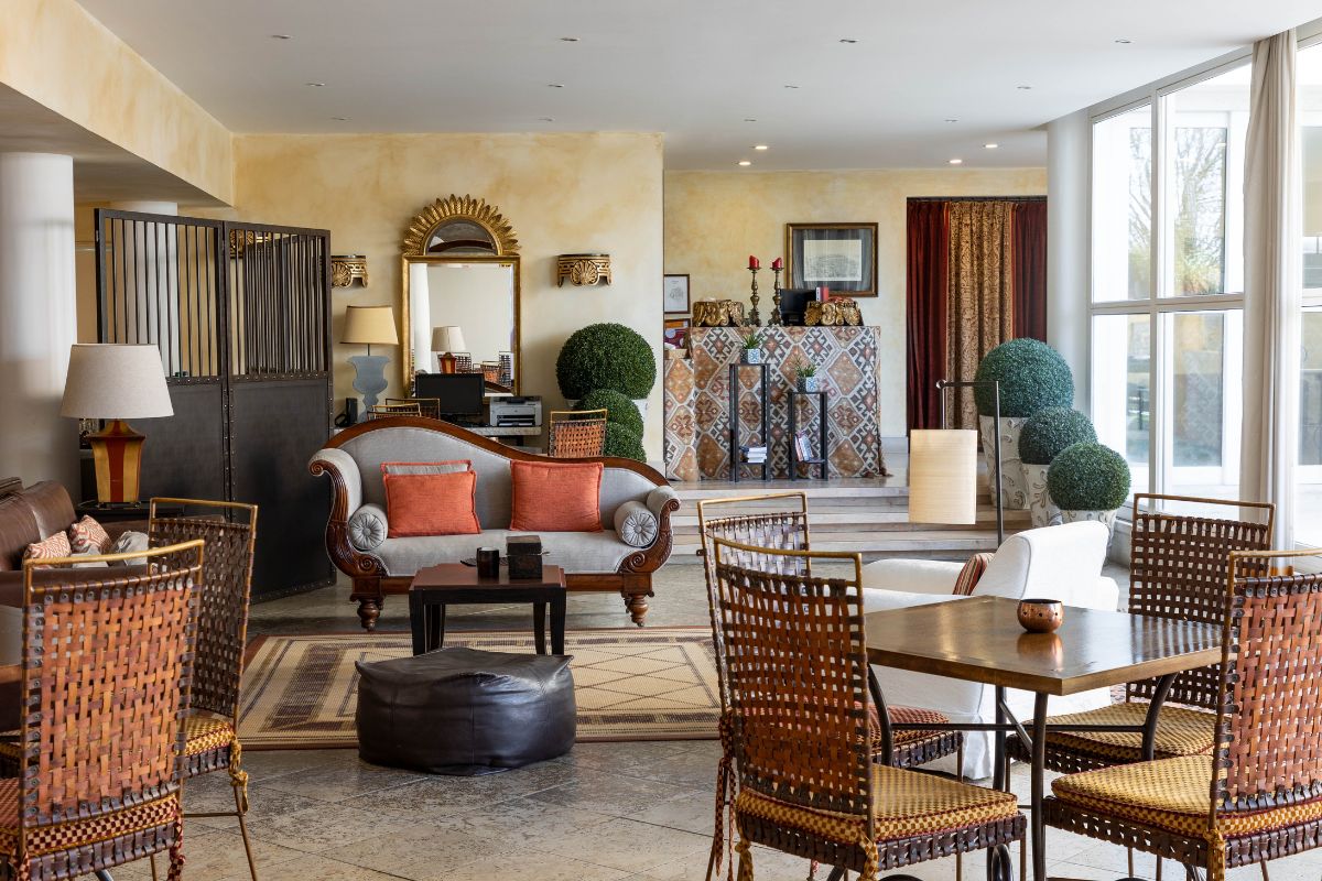 a room with furniture and a mirror