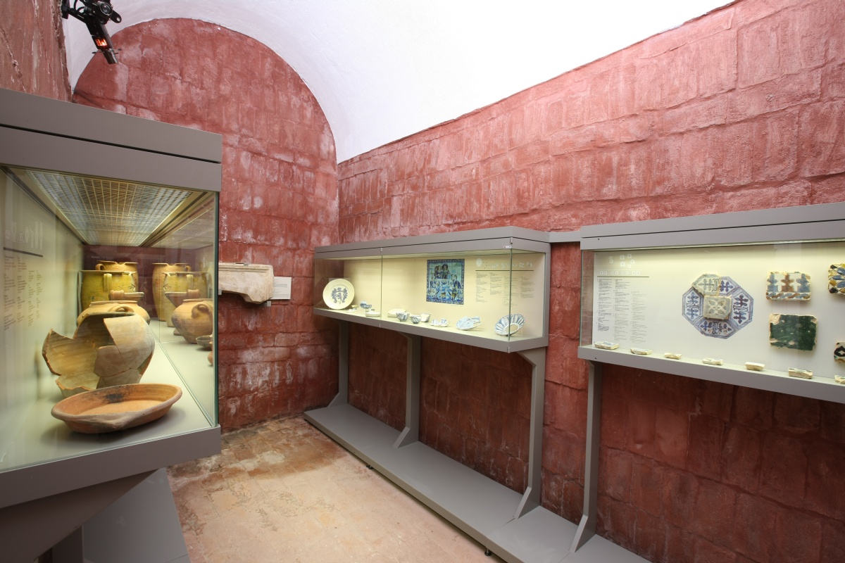 a display case with objects on it