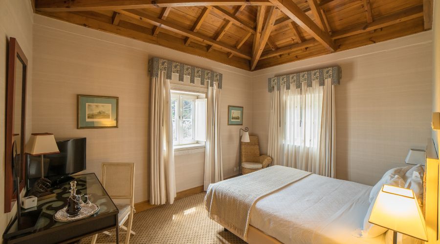 a room with a bed and a chair