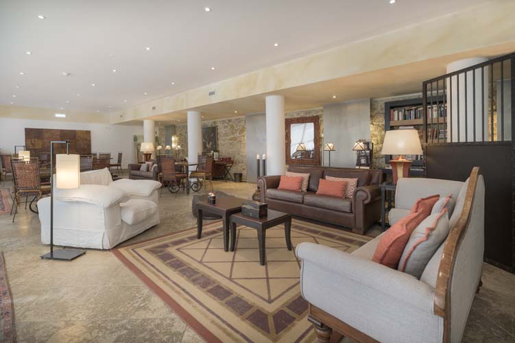 a room with couches and chairs