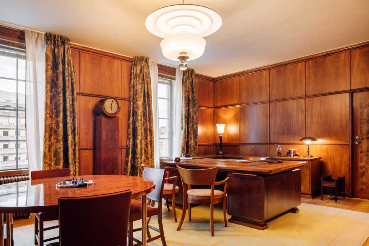 a room with a table and chairs