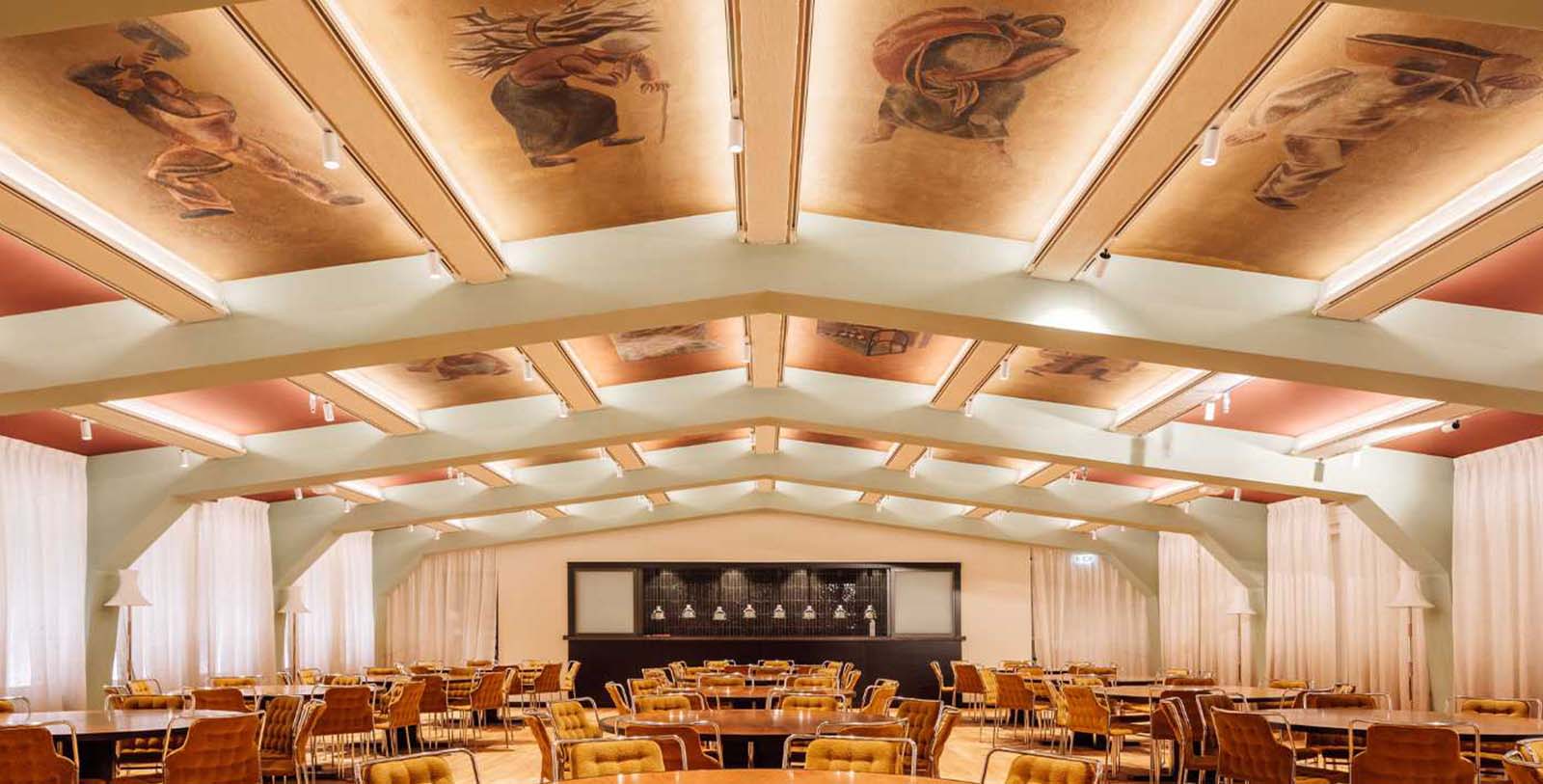 a room with chairs and tables