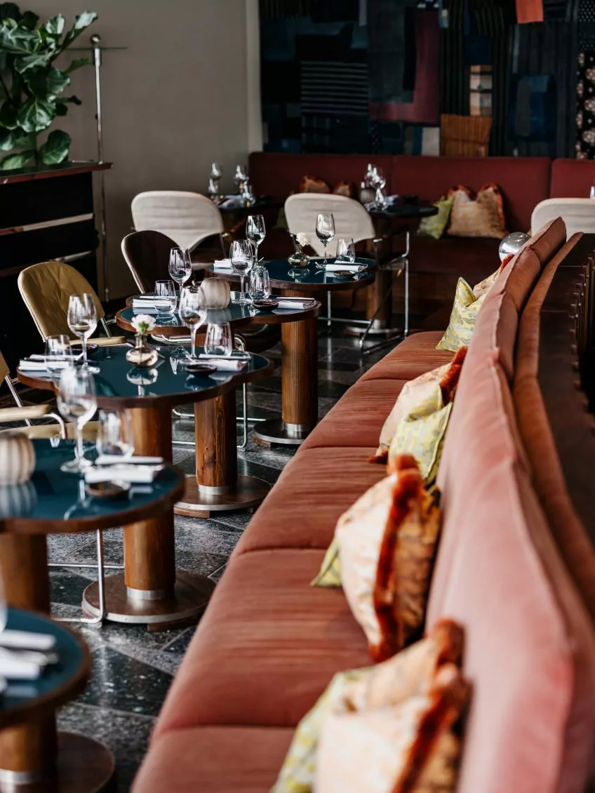 a restaurant with tables and chairs