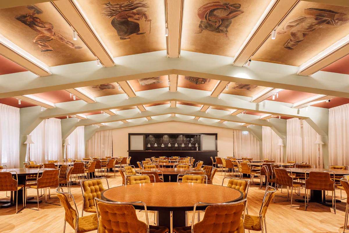 a room with tables and chairs