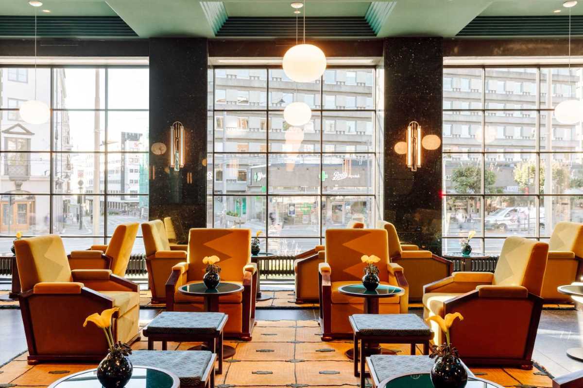 a room with chairs and tables