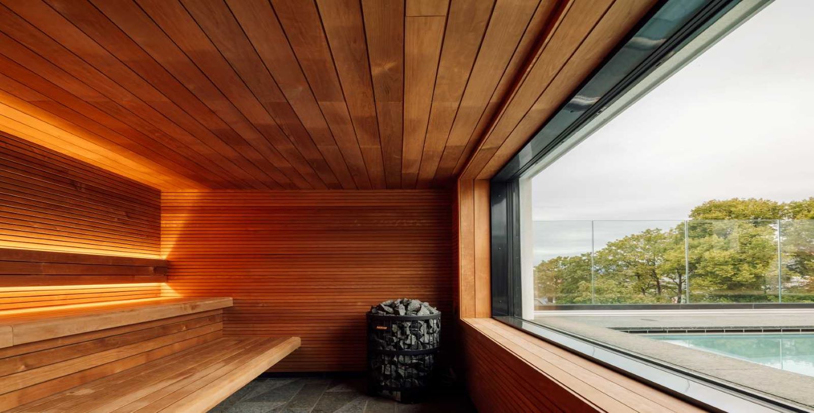 a sauna with a bucket of coal