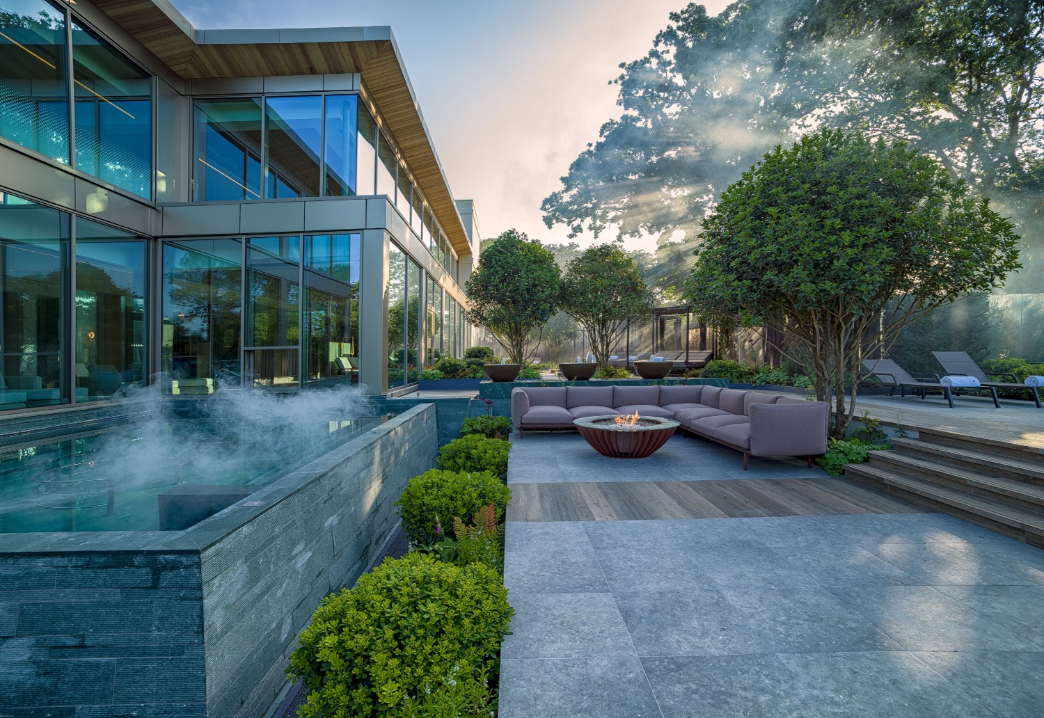 a fire pit outside a building