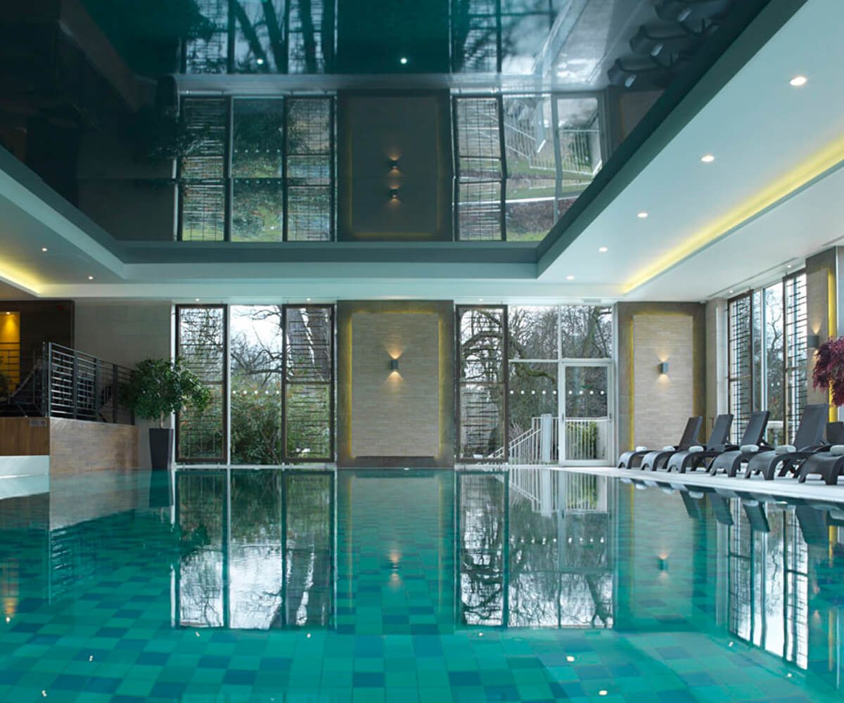a swimming pool inside a building