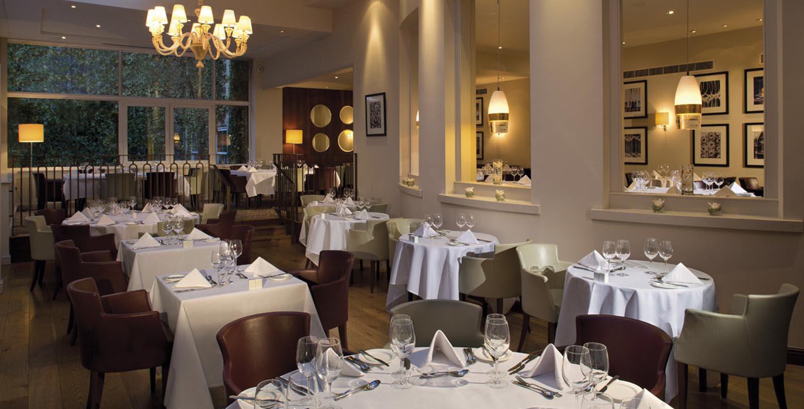 a restaurant with tables and chairs