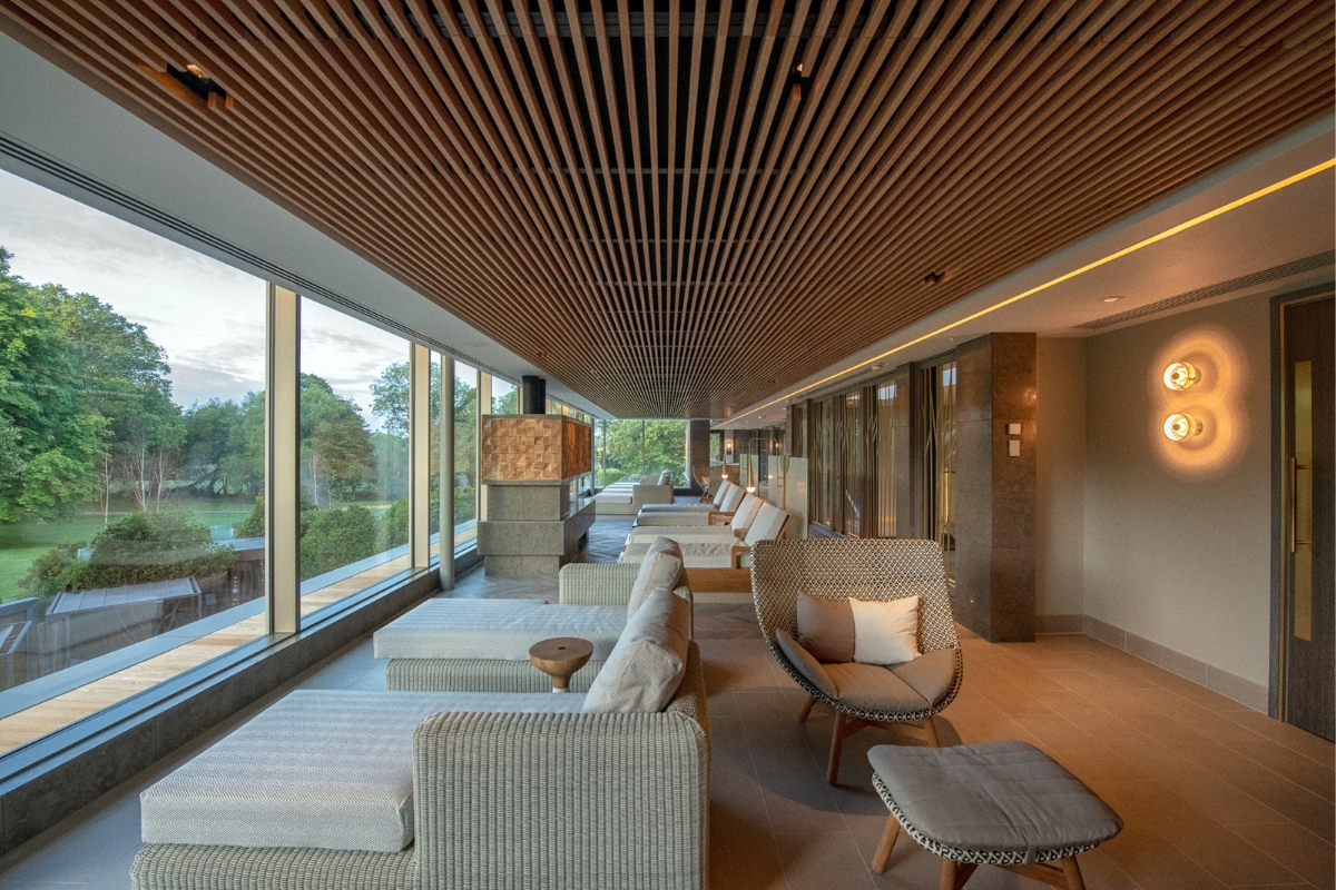 a room with couches and chairs