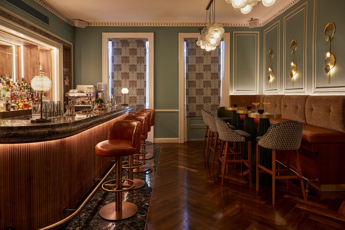 a bar with chairs and tables