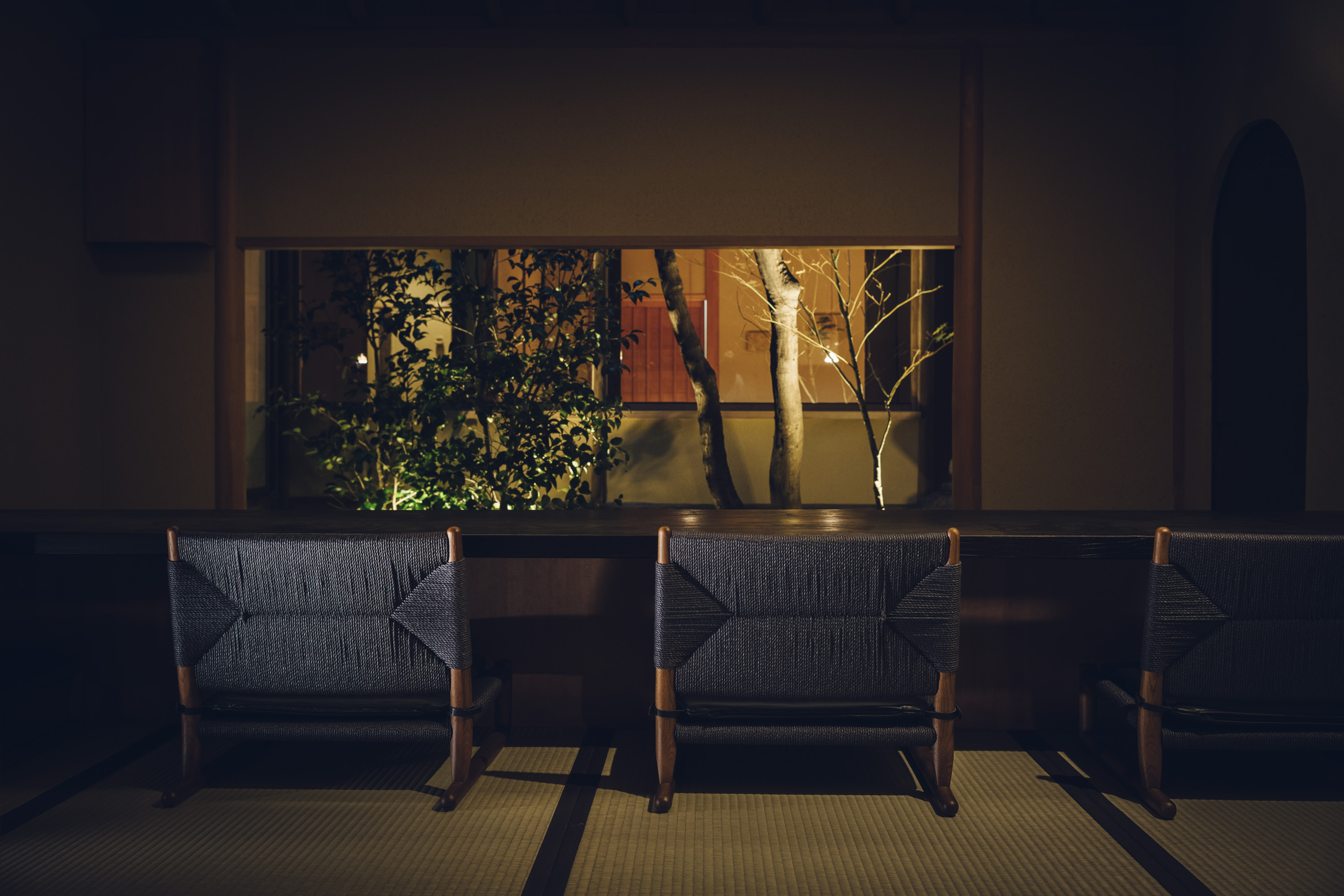 a chair next to a table