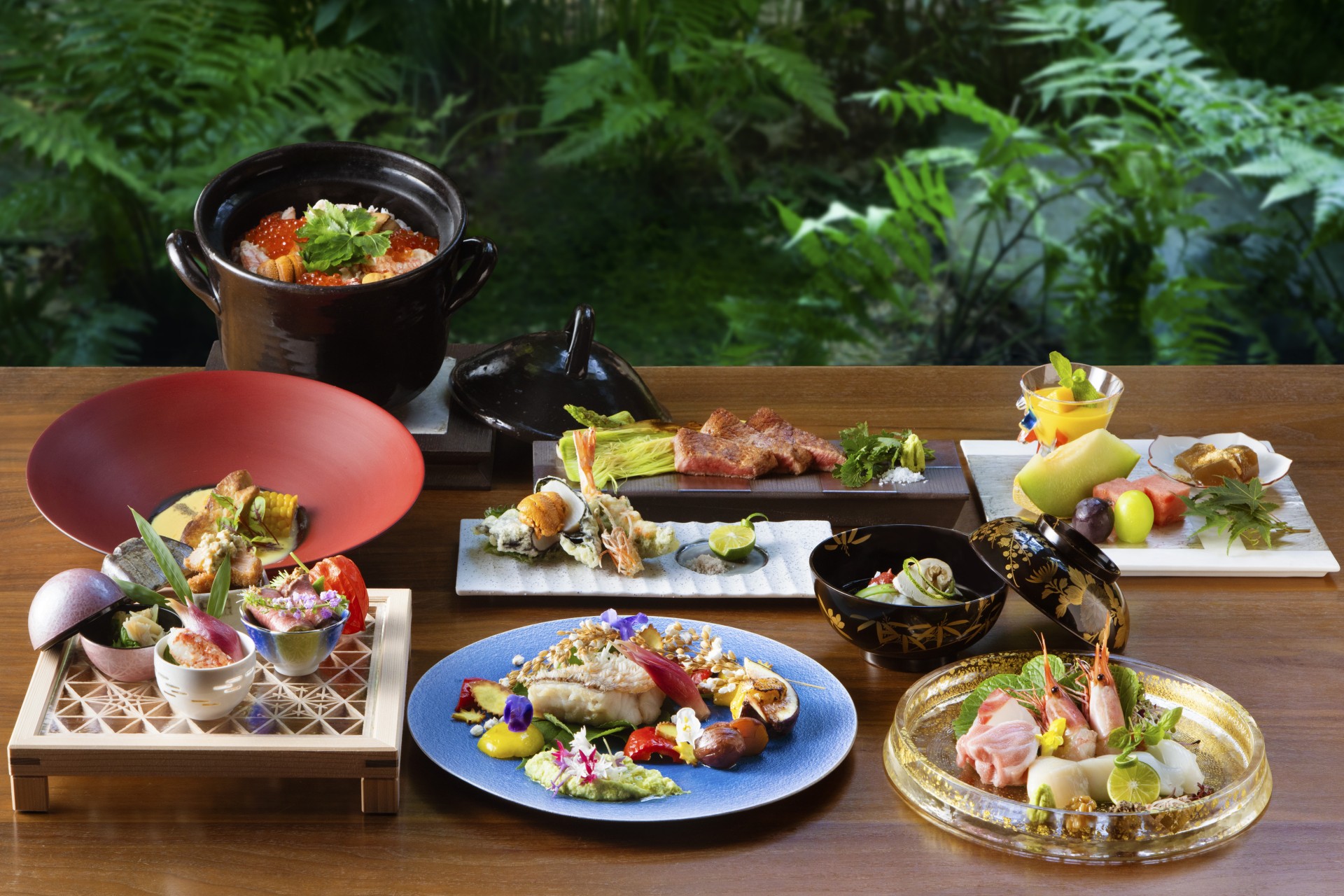 a table with different plates of food