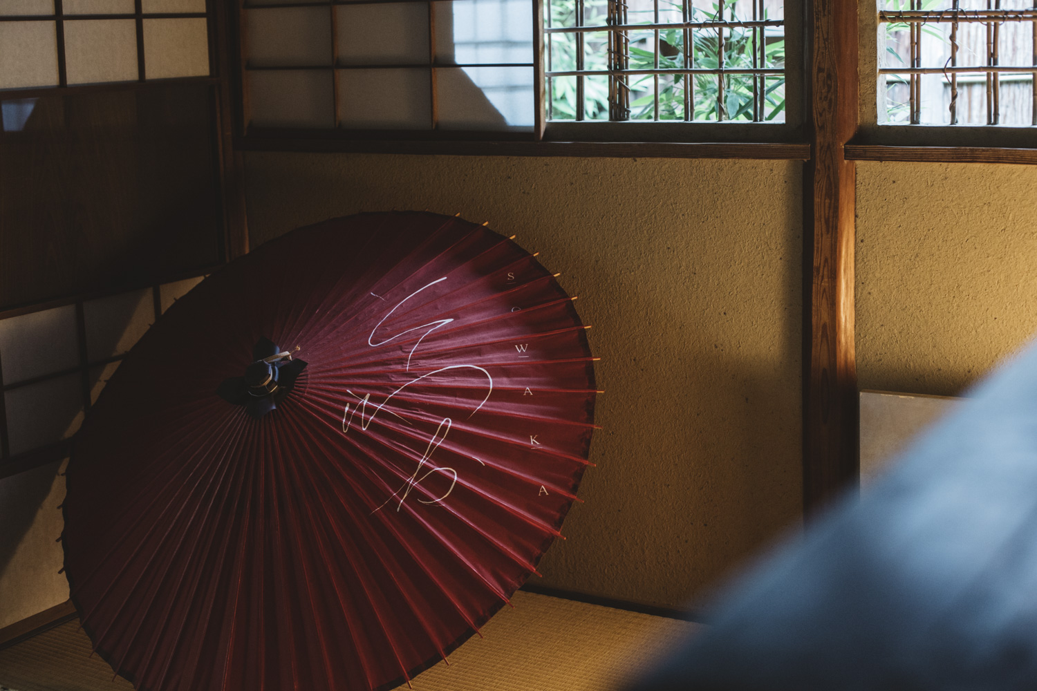 a red umbrella with writing on it