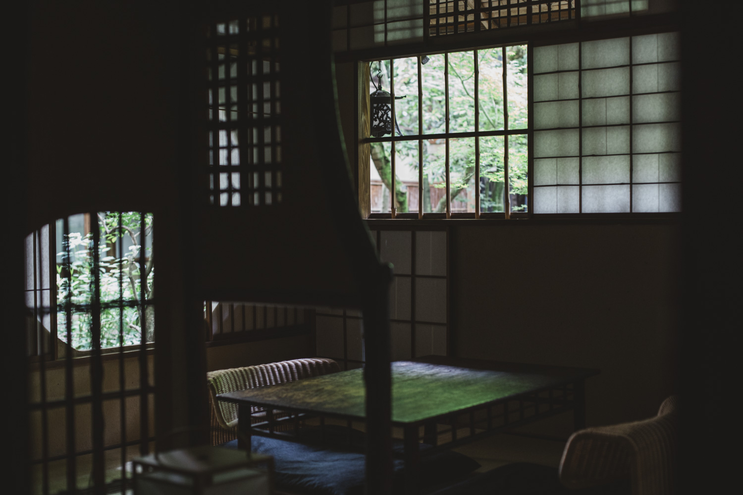 a room with a table and chairs
