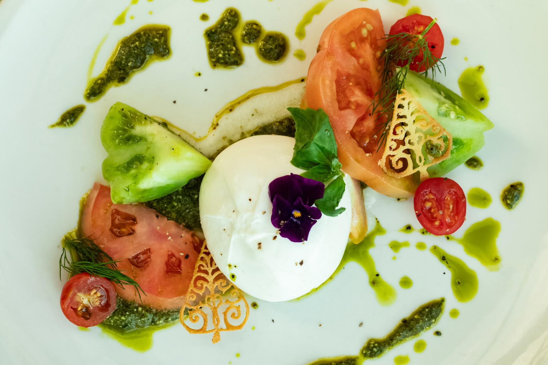 a plate of food with a flower on it