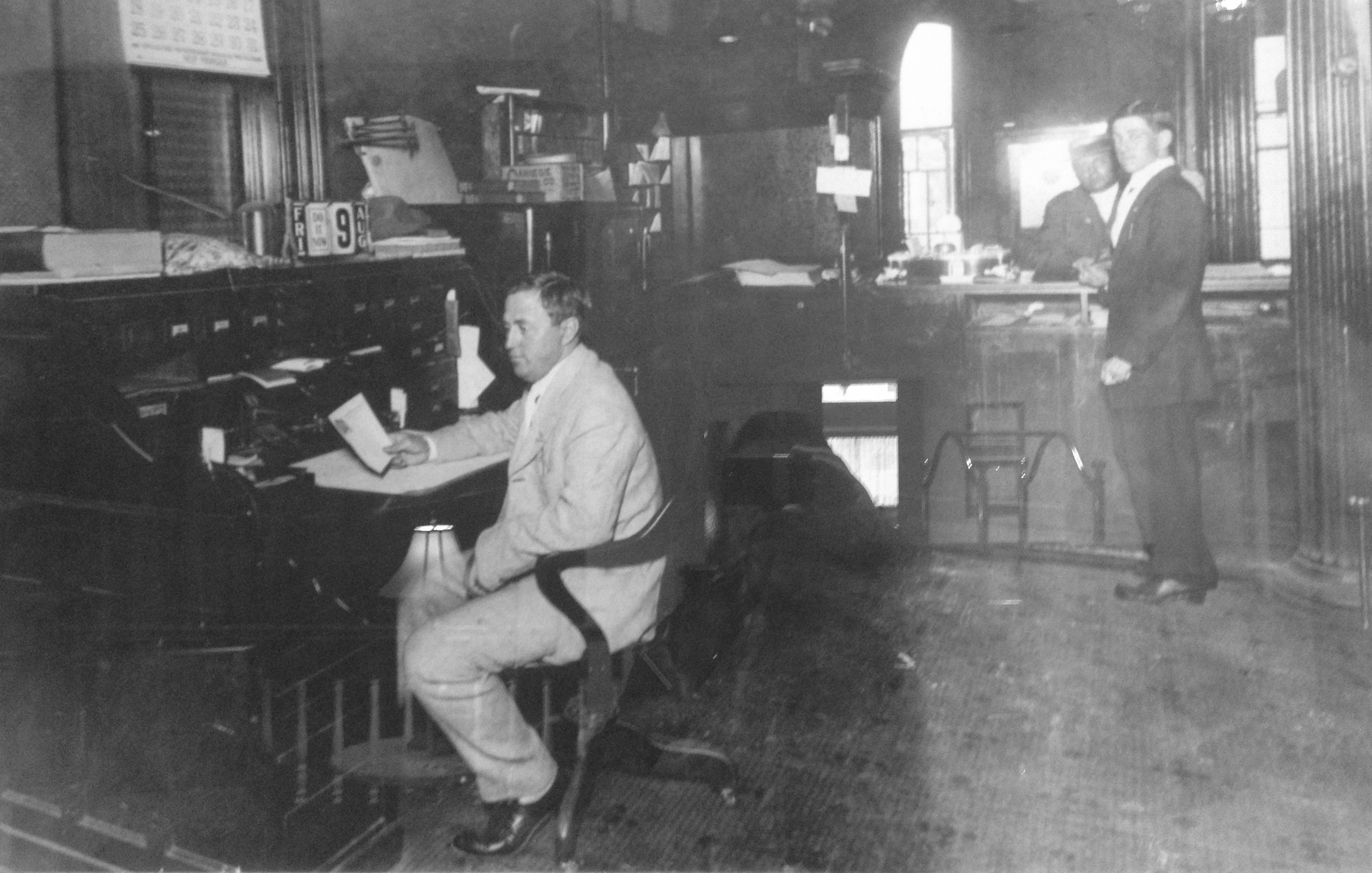 a man sitting at a desk