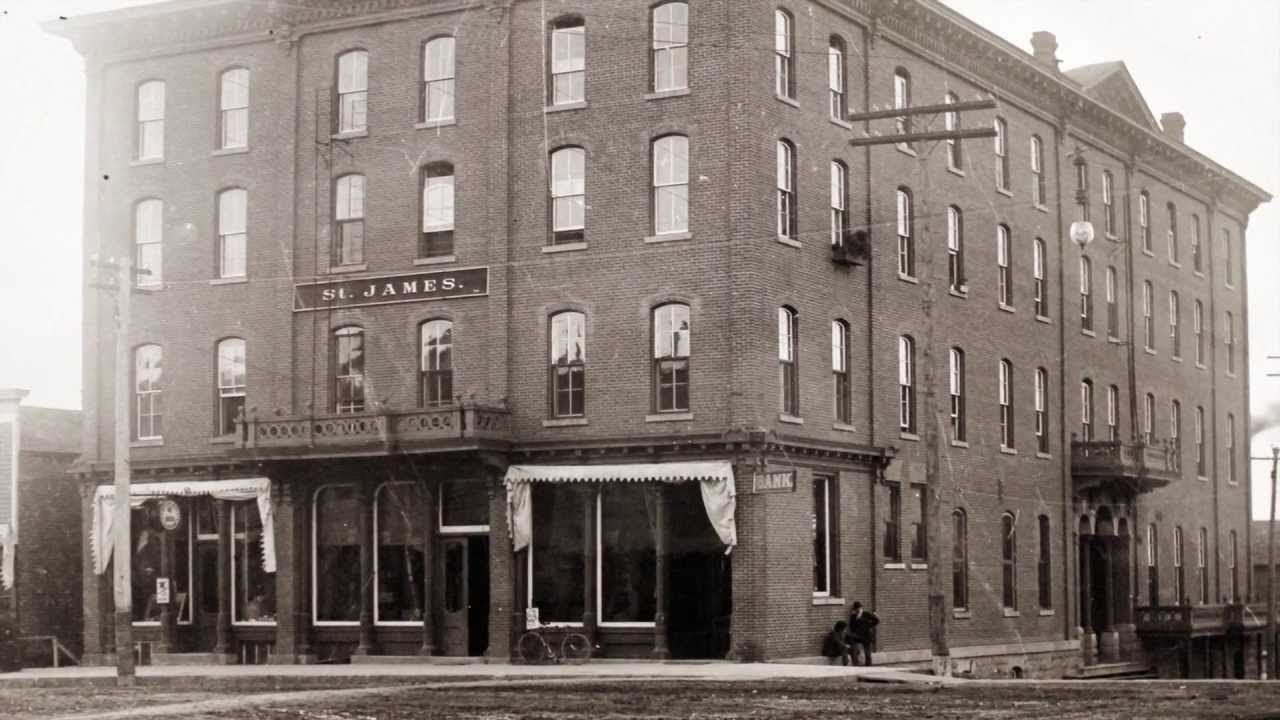 a black and white photo of a brick building