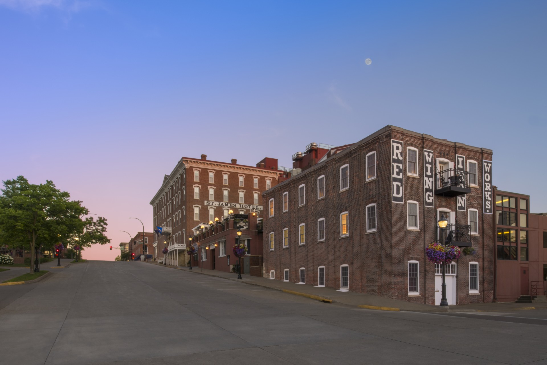 a street with buildings and trees