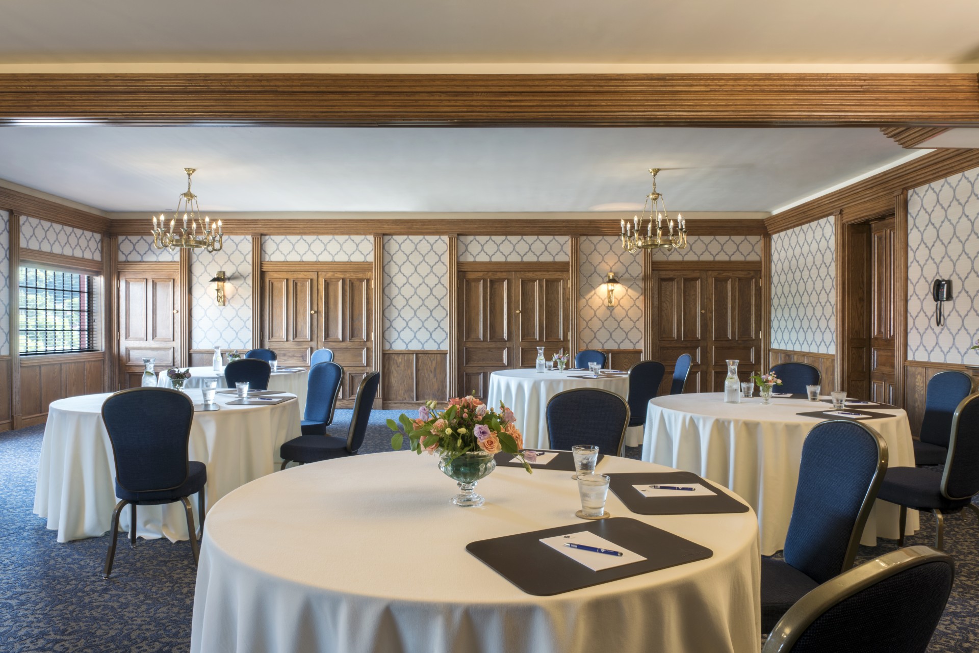 a room with tables and chairs