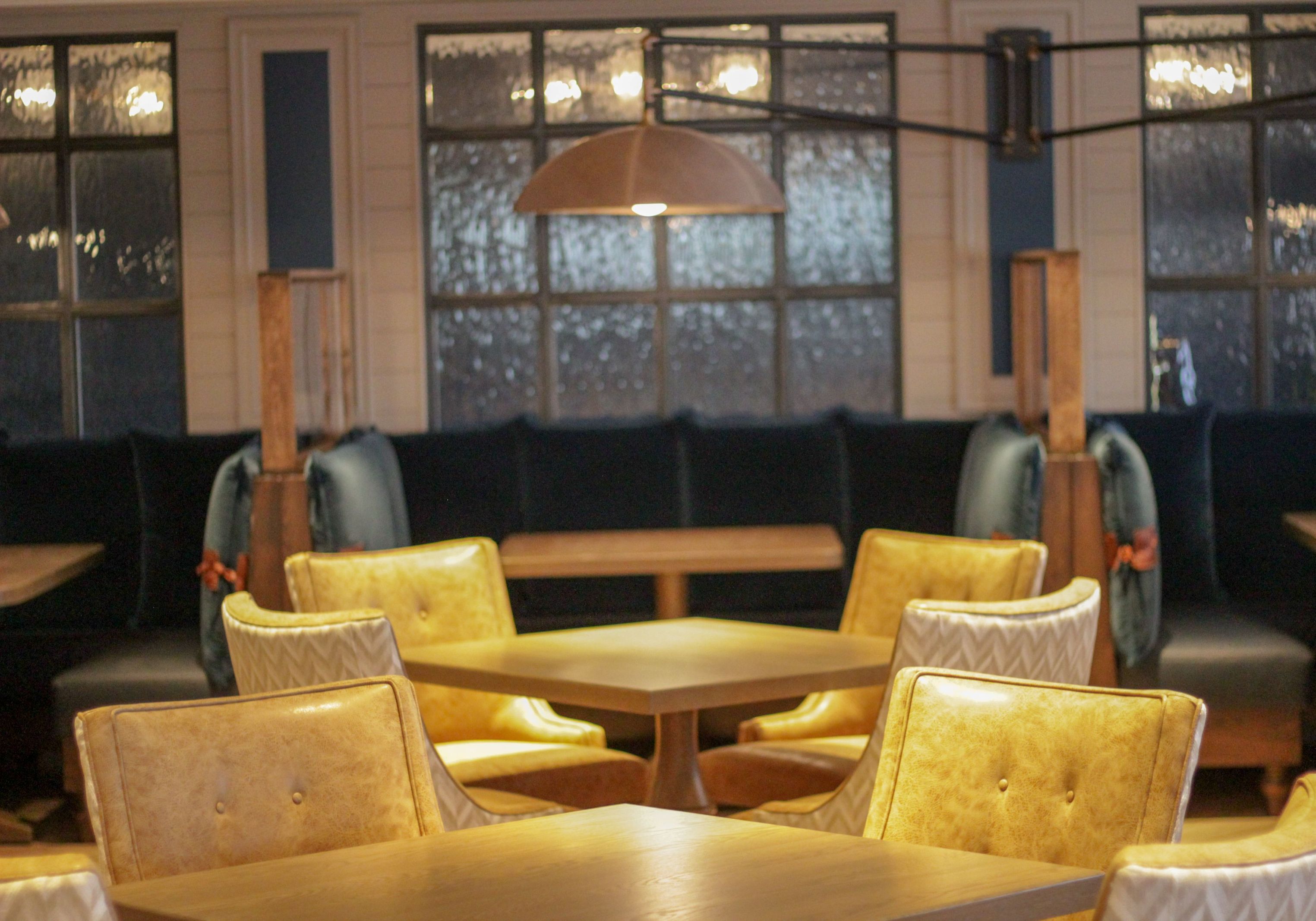 a room with a table and chairs