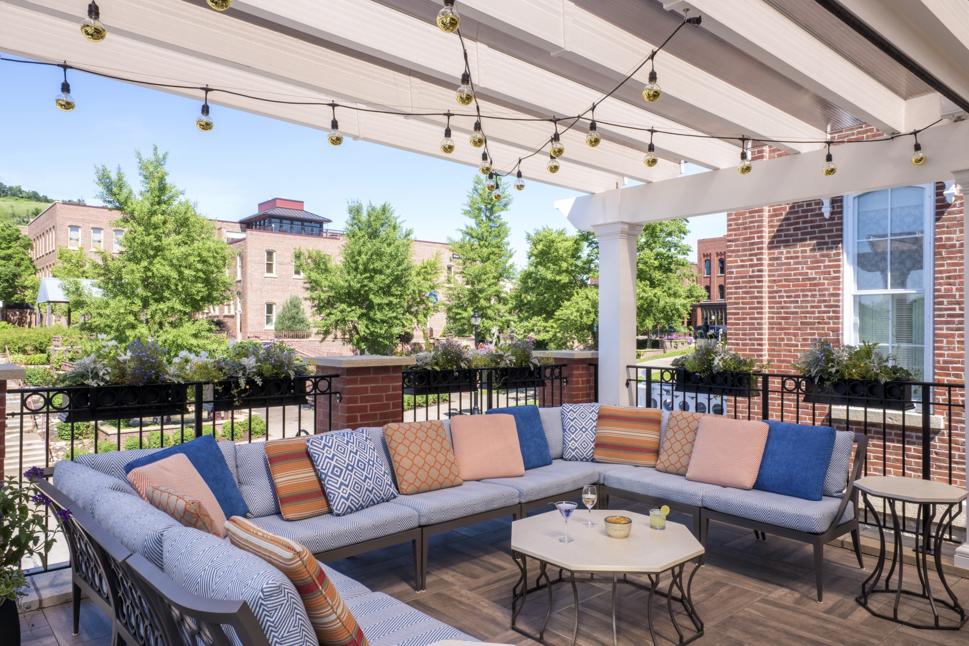 a patio with a couch and a table
