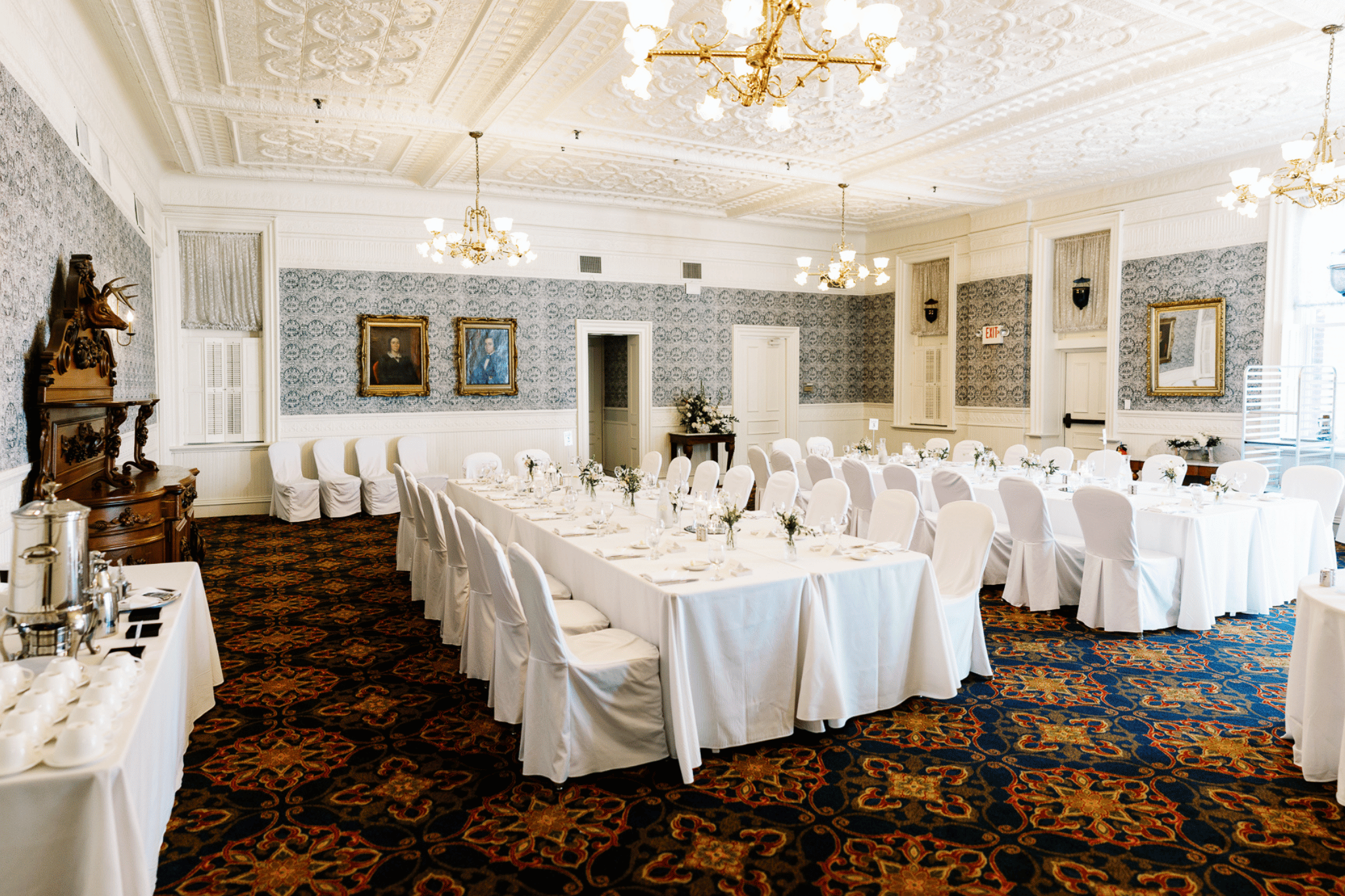 a large room with tables and chairs