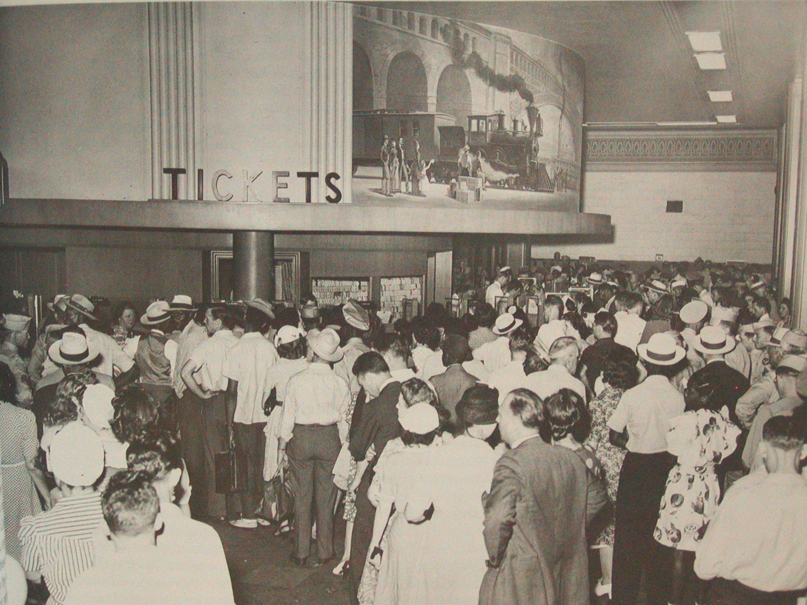 a group of people standing in a room